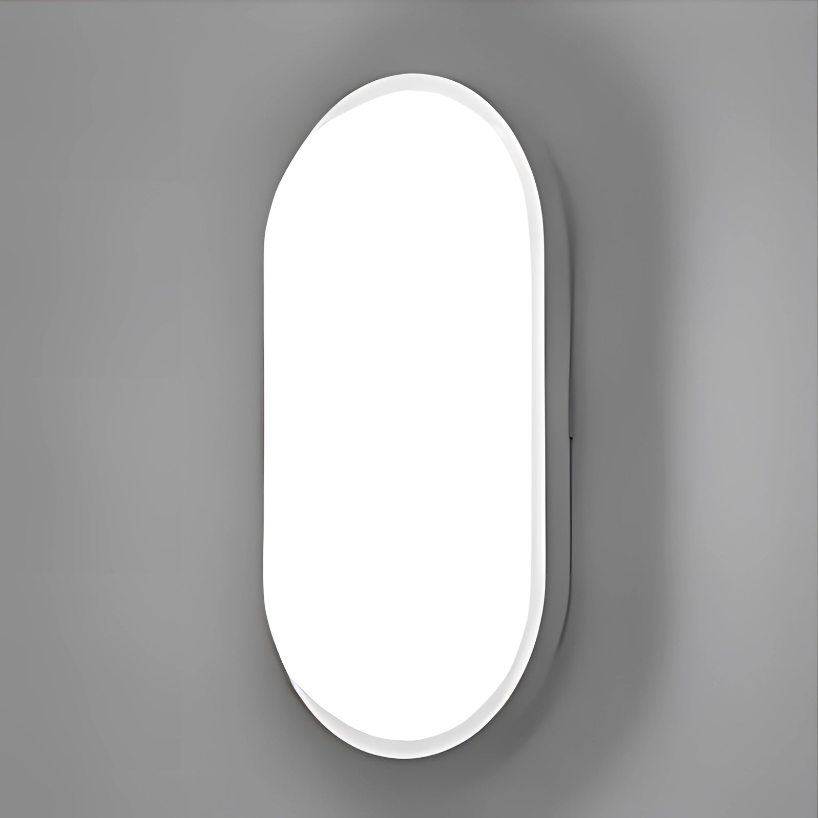Oval-shaped modern circular wall light featuring a minimalist and futuristic design with a cold white glow, suitable for home lighting.