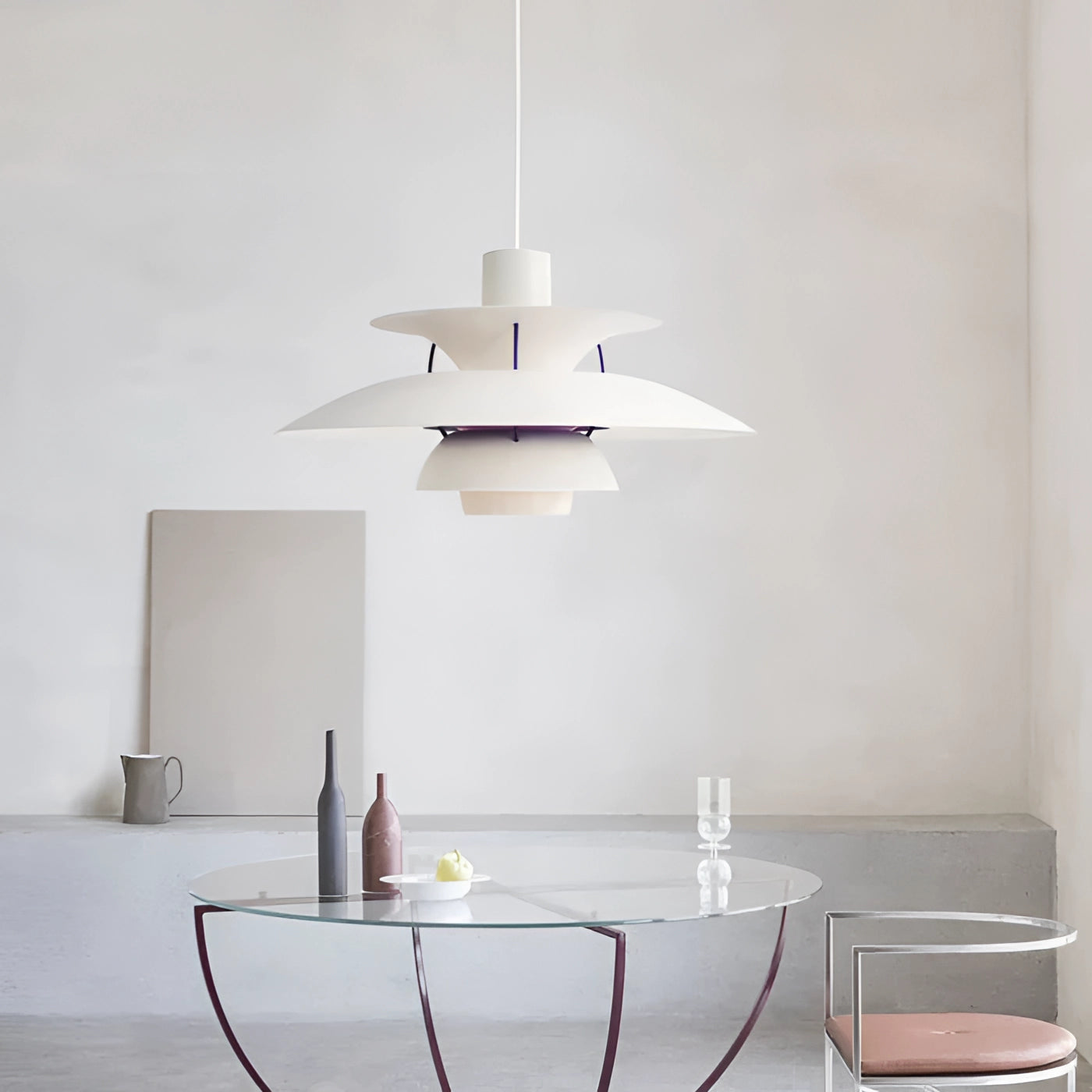 Modern Scandinavian design multi-tiered pendant lighting in white and purple, with a diameter of 50cm, emitting warm white light, hanging in a stylish interior setting with grey flooring and wooden elements.