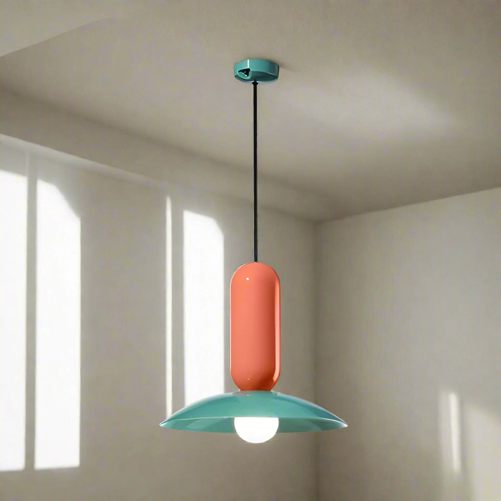 Modern colorful pendant light with a Scandinavian design, featuring a red shade measuring 40 x 36 cm. The light fixture is suspended from the ceiling, showcasing a harmonious blend of wood and vibrant hues, perfect for enhancing kitchen or dining spaces.