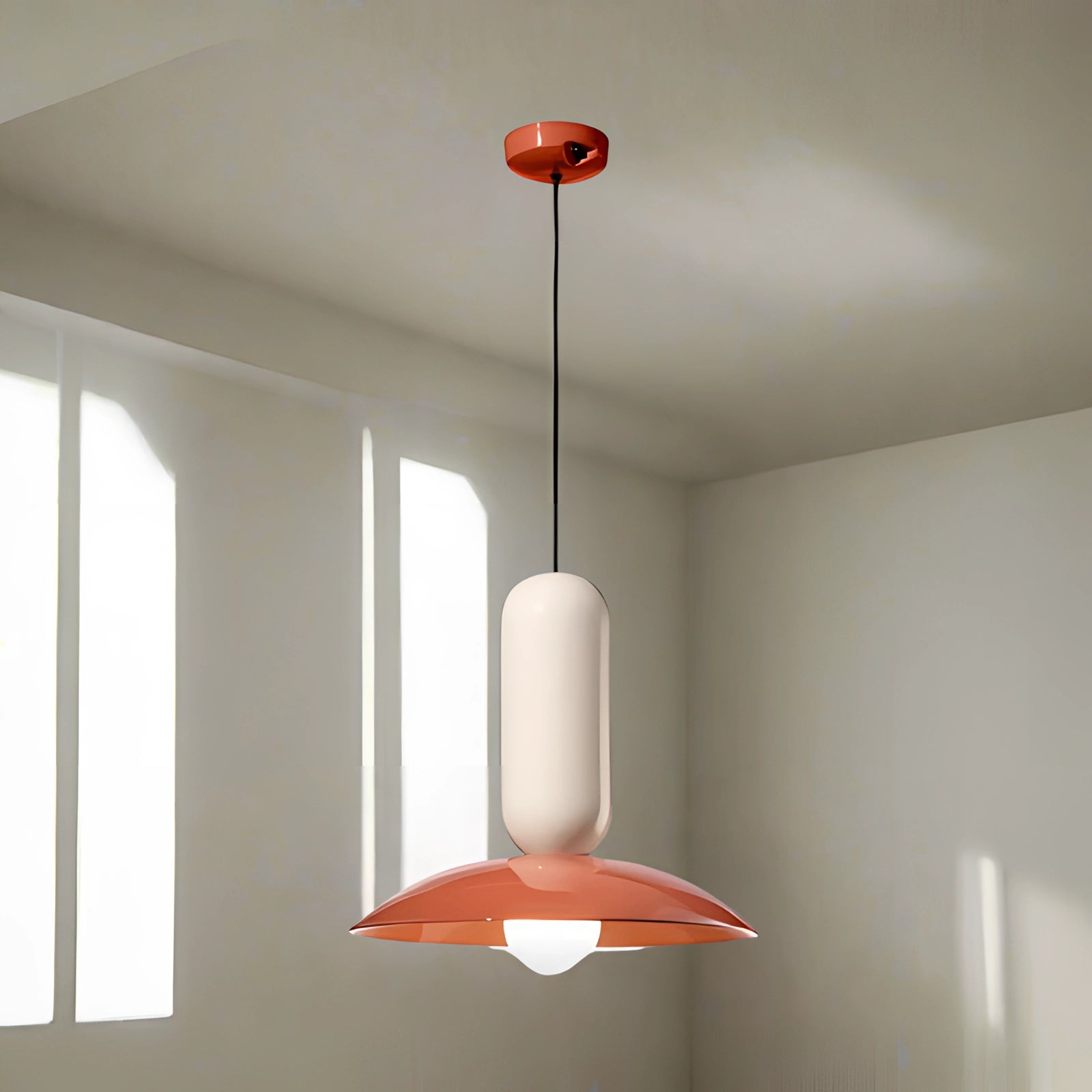 Modern Scandinavian pendant light with a white lampshade measuring 40 x 36 cm, featuring a wooden accent, hanging from the ceiling in a kitchen or dining area.