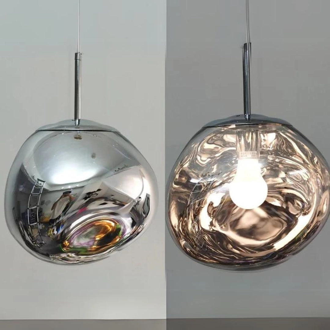 
A modern copper glass cluster chandelier with luxury pendant lighting design, featuring a sleek silver finish and 28cm diameter. The chandelier is composed of multiple transparent glass elements, creating a circular, ornamental appearance.