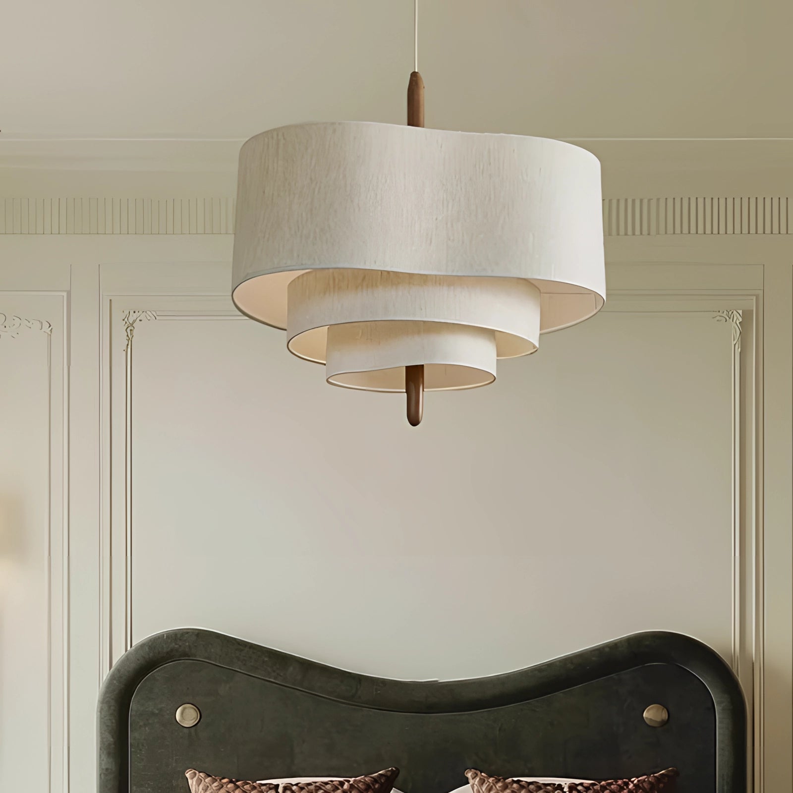Modern cream drum chandelier with two tiers, featuring wooden accents, hanging from the ceiling.