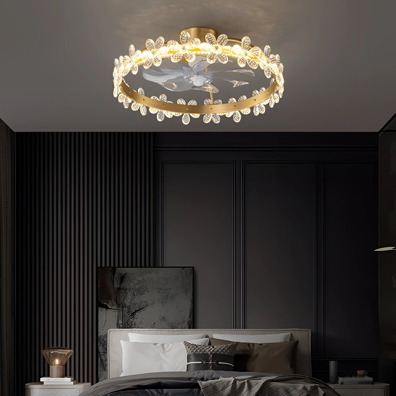 Modern crystal LED floral ceiling fan with light kit, featuring a grey wood finish, installed in a room with a rectangular layout and neutral-colored flooring.