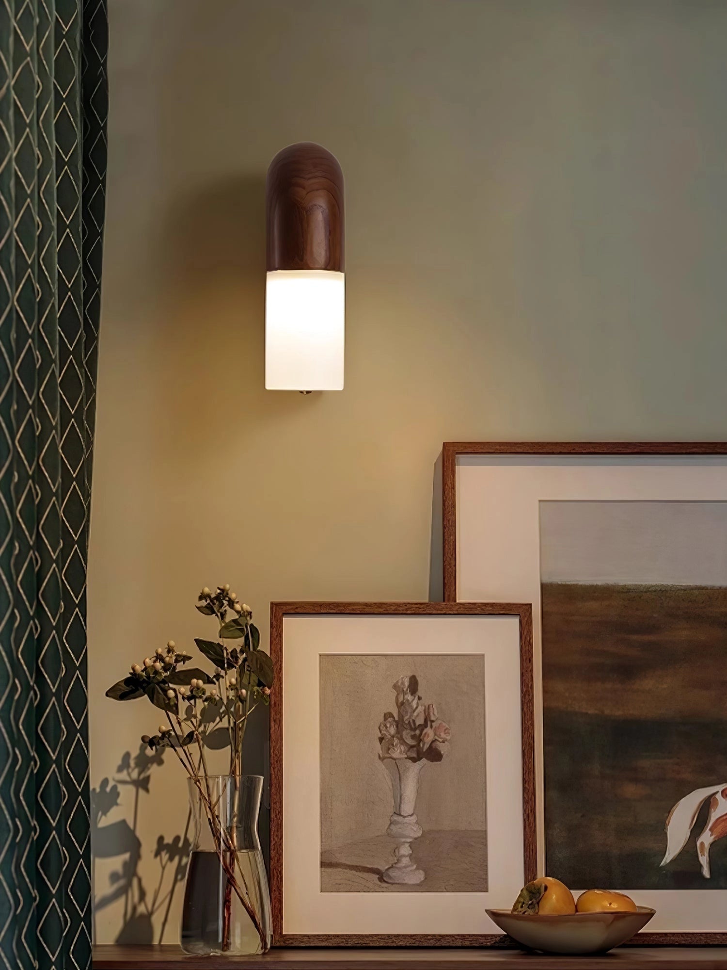 Modern curved wooden wall sconce with LED lighting, designed in a minimalist arch shape, mounted on a wall in a stylish interior setting, complemented by decorative elements such as plants and art pieces.