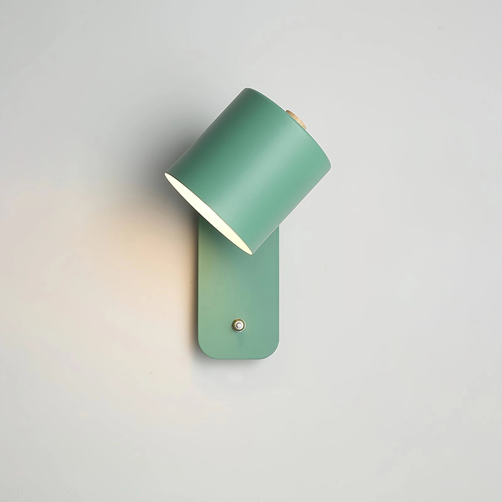 A modern cylindrical LED wall lamp with a minimalist metal sconce design, featuring a sleek metallic finish mounted on a rectangular base.