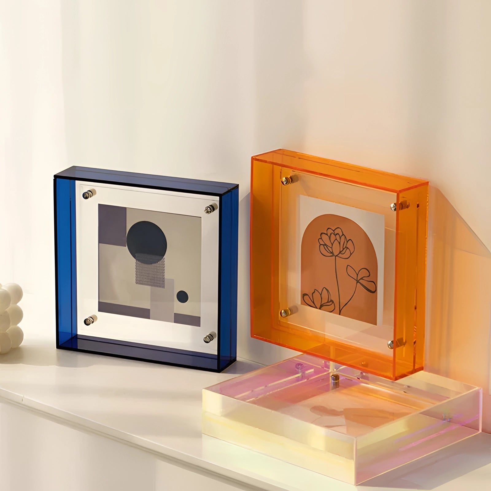 
A contemporary acrylic color block sculpture featuring a geometric design with circular and rectangular elements, showcasing a modern aesthetic.