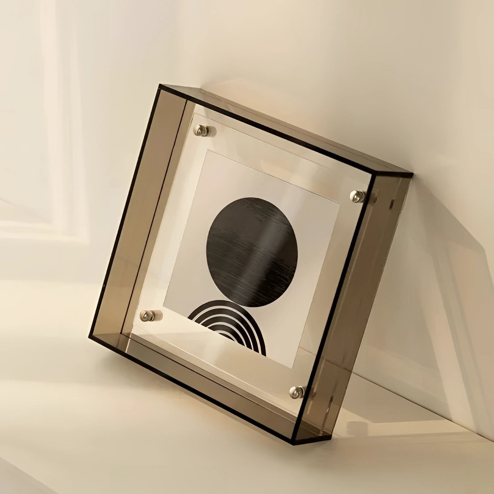 Modern decorative acrylic color block sculpture in black and grey, featuring a rectangular shape with circular and spherical elements, measuring 21cm x 16cm, designed as luxury art for contemporary home decor.