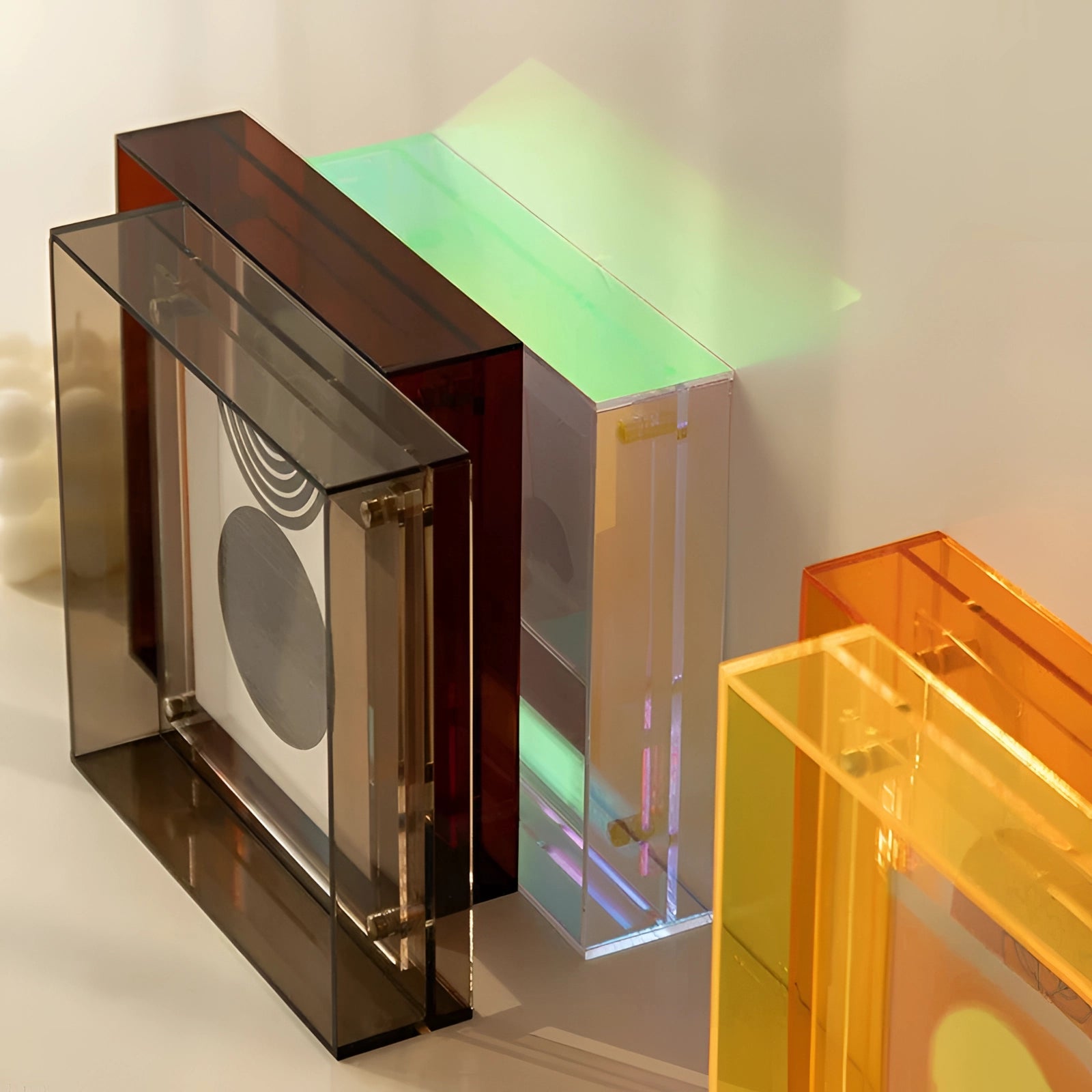 Modern decorative acrylic color block sculptures featuring a sleek rectangular design, suitable for luxury interior settings.