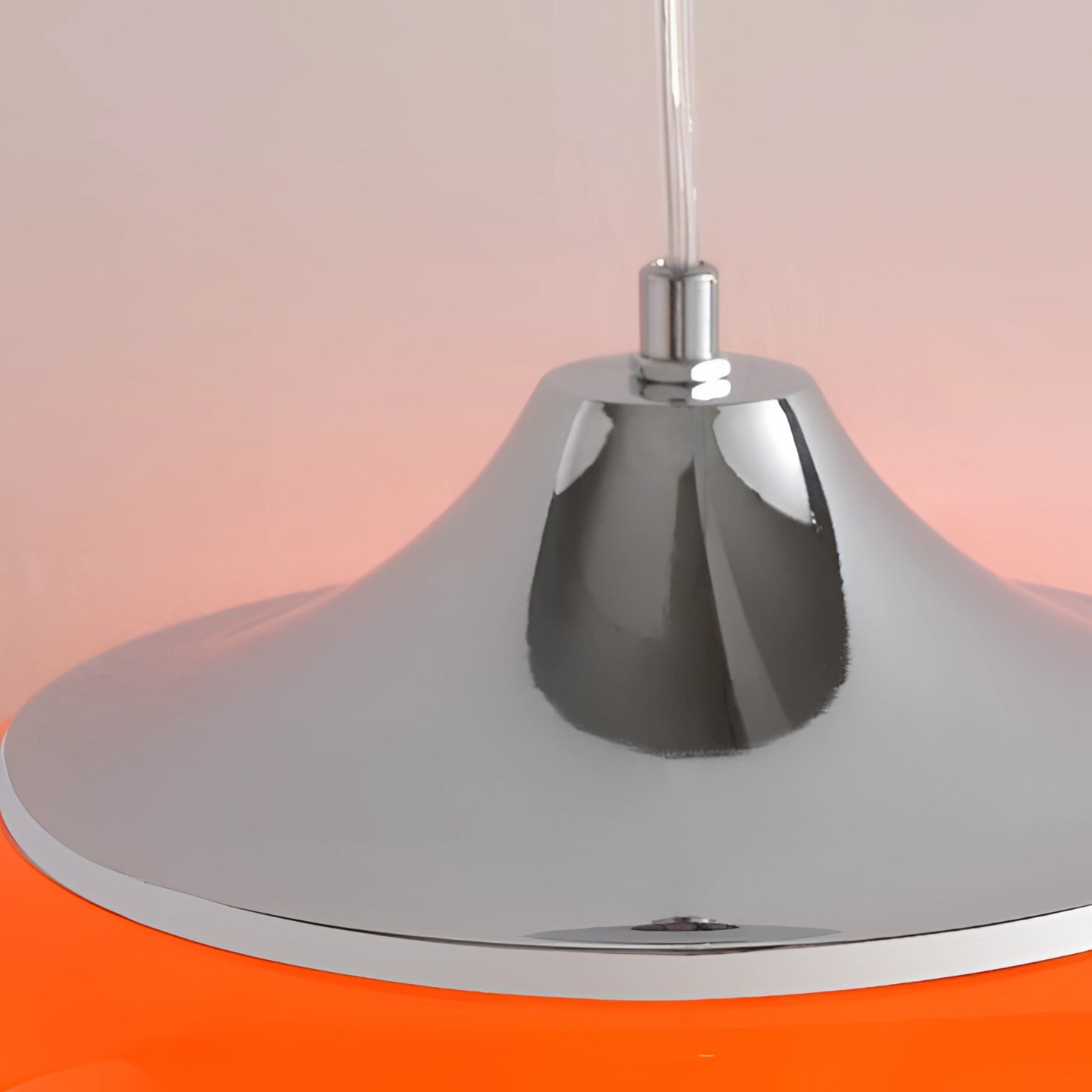 Modern dual color pendant lamps with a Scandinavian mid-century style, featuring sleek designs with wood and composite material accents, hanging from a ceiling, illuminating the space with their circular light fixtures.