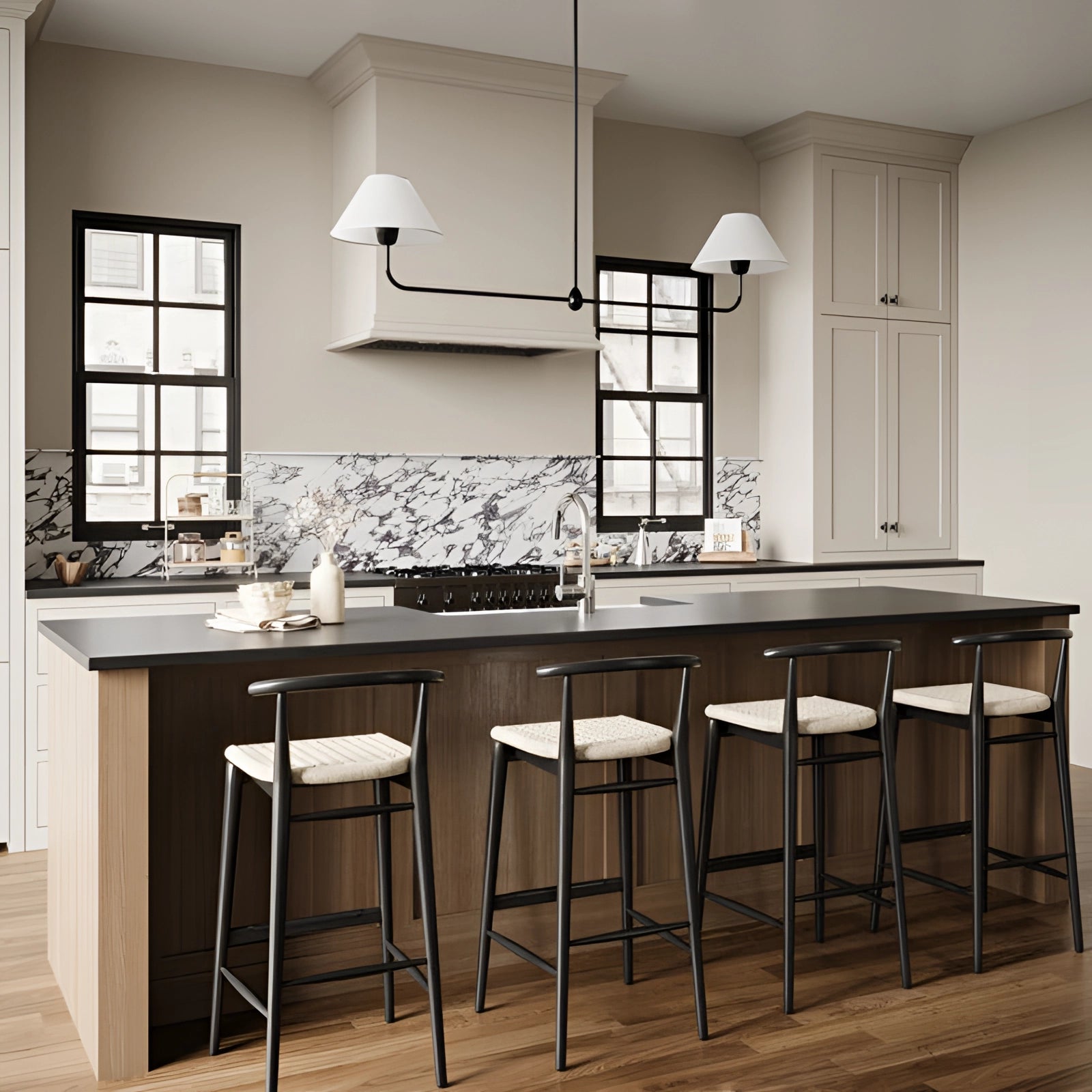 Modern dual lamp black LED chandelier with double cone pendant lights hanging over a contemporary kitchen interior, featuring wooden cabinetry, sleek countertops, and expansive windows.