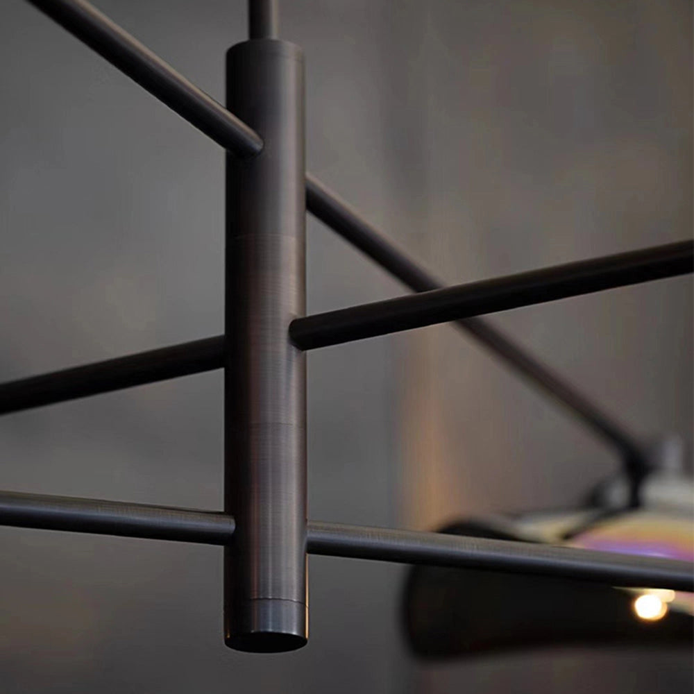 Modern black and chrome multi-light chandelier with a geometric design, featuring metal and glass elements.