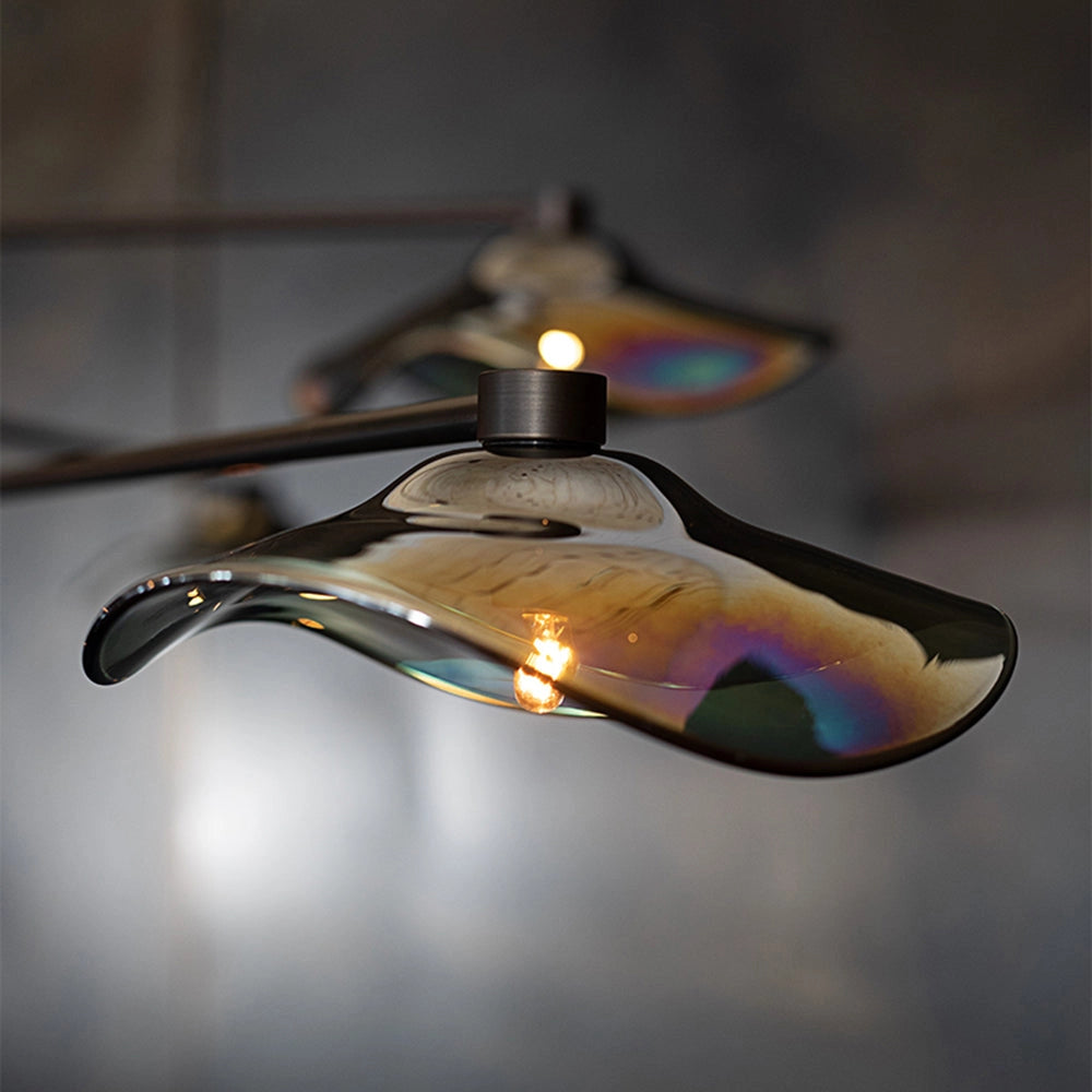 Modern geometric black and chrome multi-light chandelier with multiple glass lights, designed as a ceiling fixture.