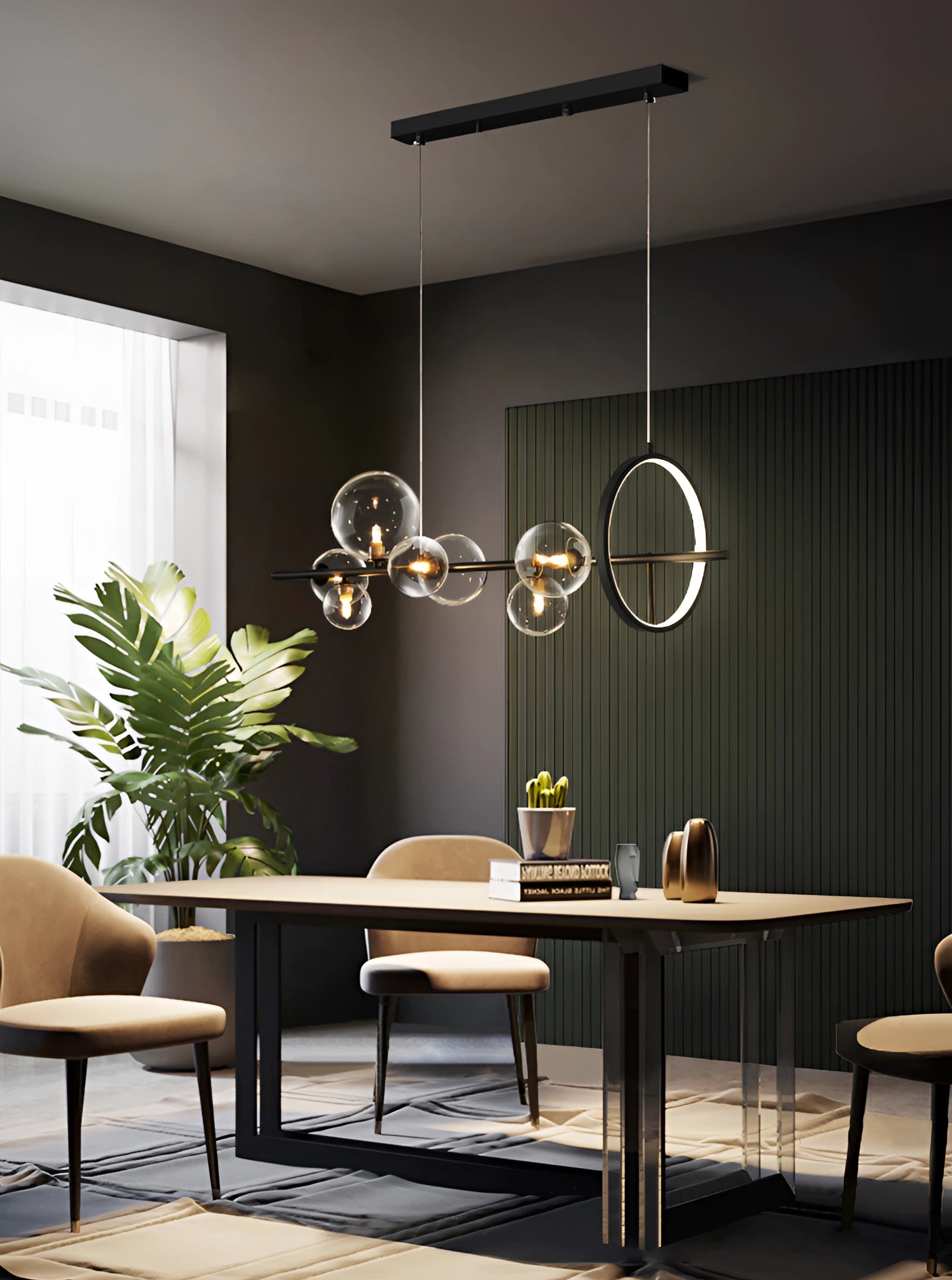 A modern geometric brass and glass chandelier hanging above a dining table with chairs, indoor plants, and large windows in a well-lit contemporary interior design setting.
