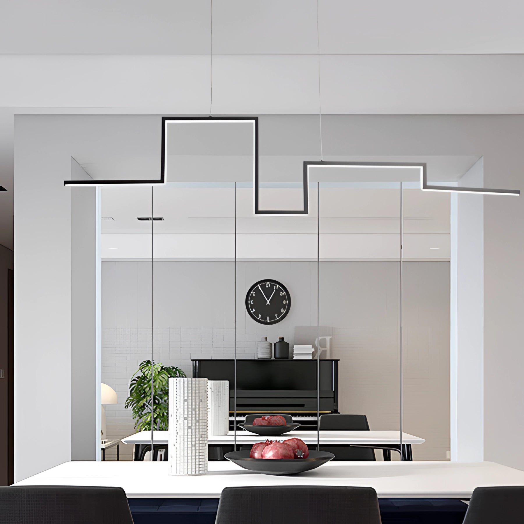 Modern geometric chandelier with luxury LED pendant light, dimmable feature, hanging above a stylish table and chair setup, featuring contemporary interior design elements and a houseplant for added elegance.