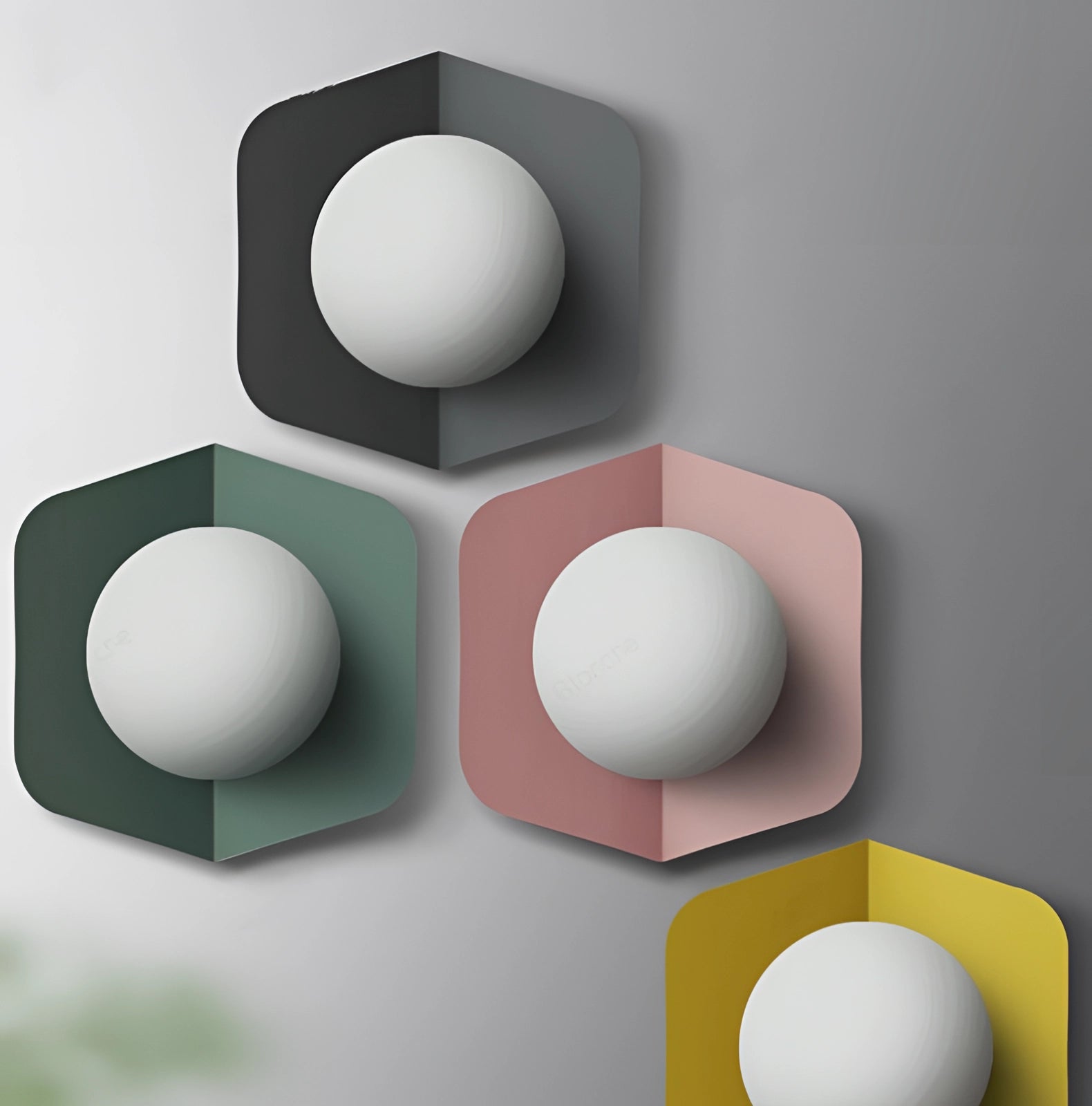 Modern geometric LED wall lamps with multi-color hexagonal fixtures, featuring a sleek and contemporary design.