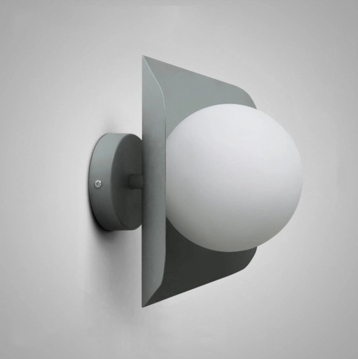 Modern geometric LED wall lamps with multi-color hexagonal fixtures in gray, mounted on a wall, emitting light.