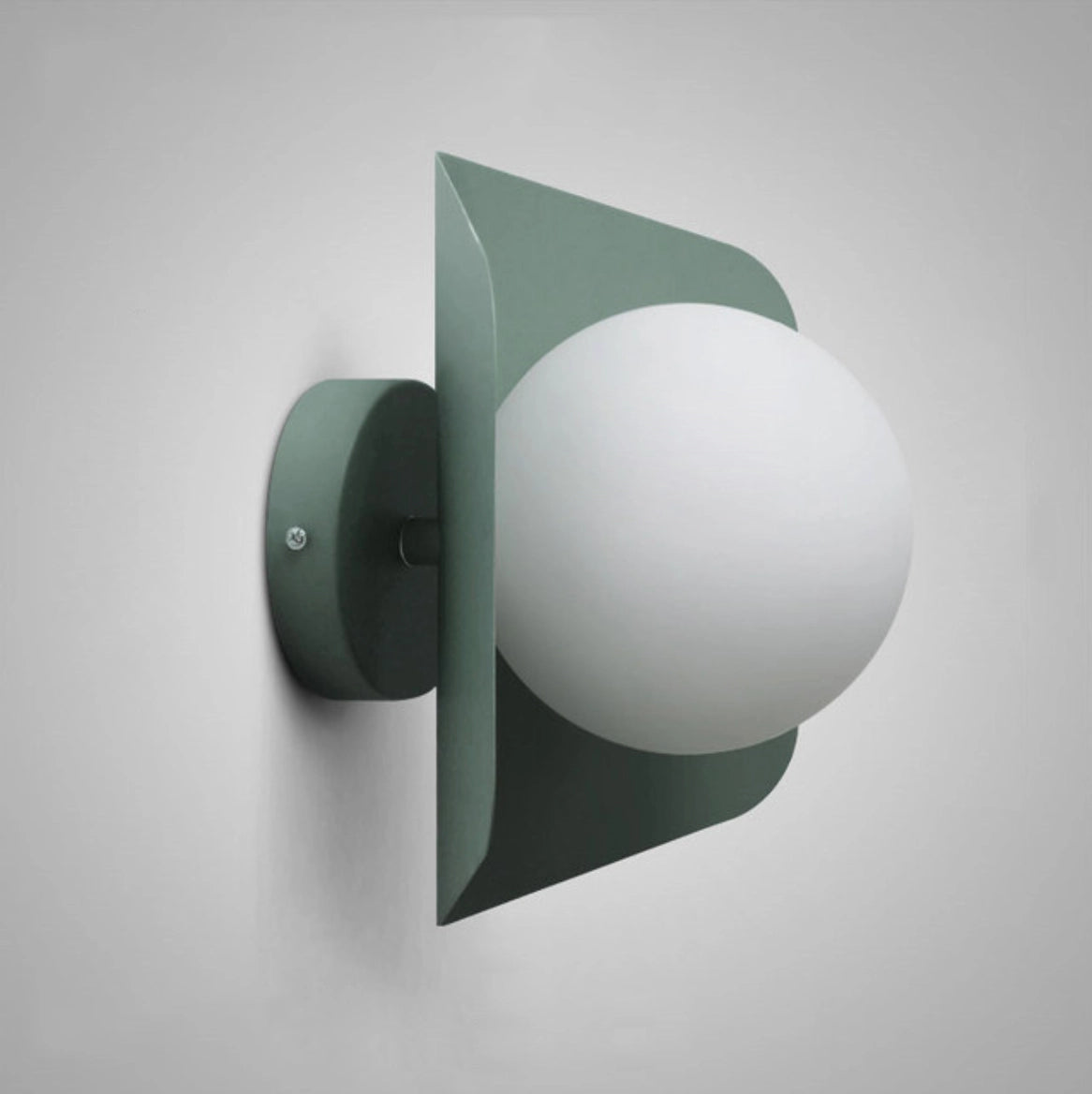 Modern geometric LED wall lamp featuring green multi-color hexagonal fixtures, illuminating a room with artistic and stylish lighting.