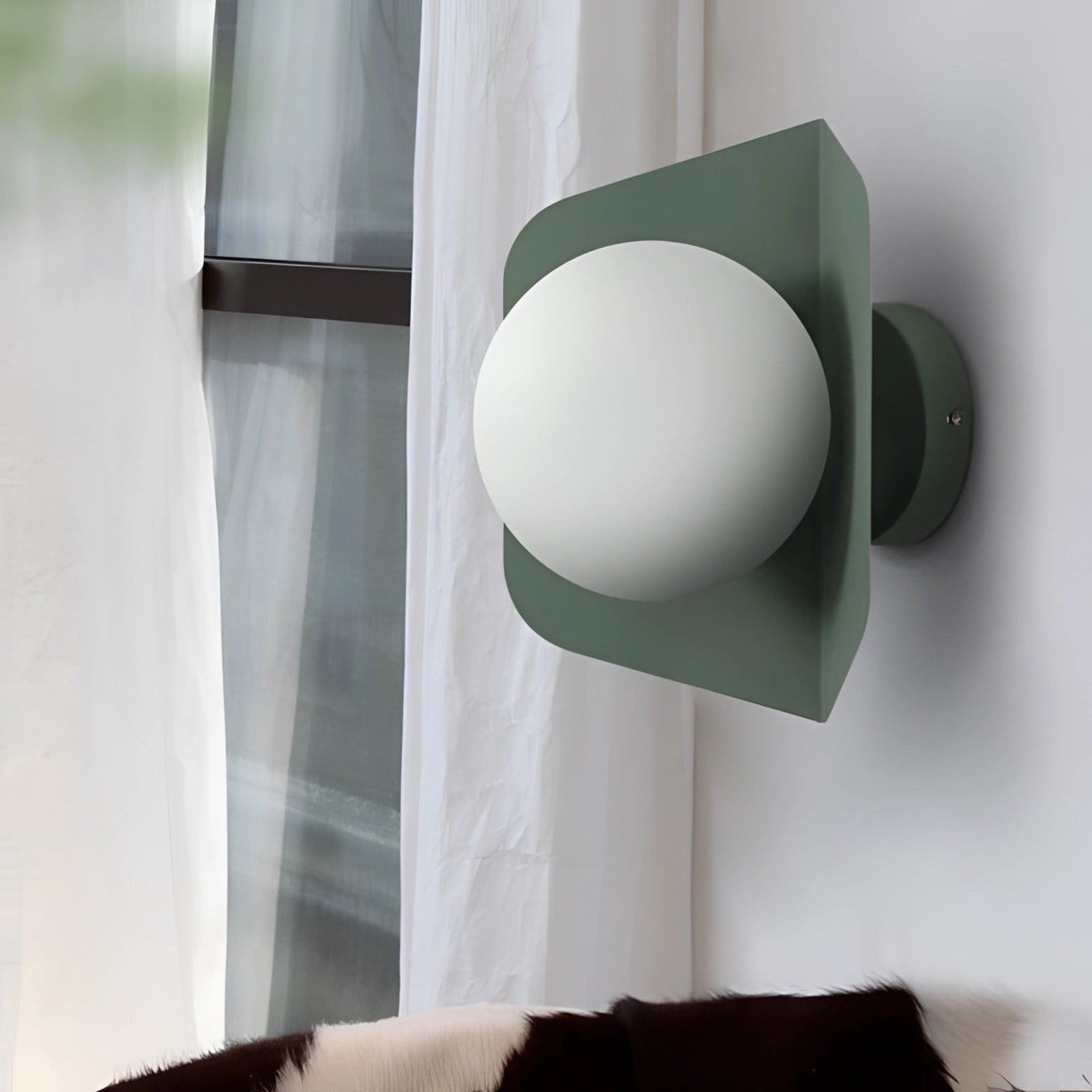 Modern geometric LED wall lamps with multi-color hexagonal fixtures illuminating a stylish interior design setting.
