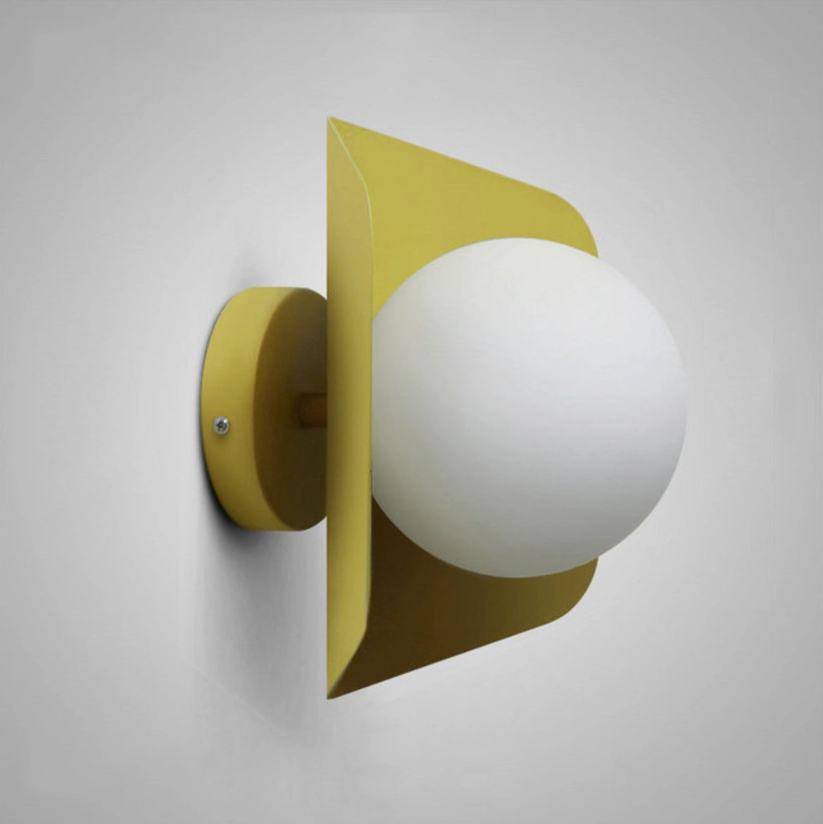 Modern geometric LED wall lamp with hexagonal fixtures in yellow, featuring a multi-color design and illuminated with soft, ambient lighting.