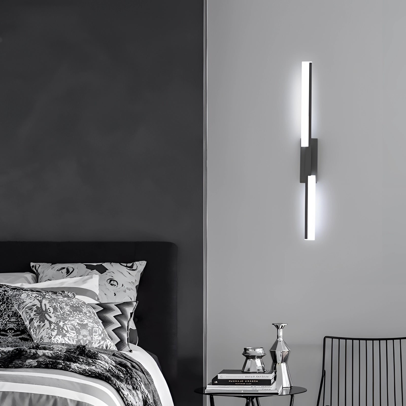 Modern geometric LED wall sconce in black and white with a minimalist design, measuring 23.6 inches. The sconce features three color change options controlled by a switch, suitable for contemporary interior design.