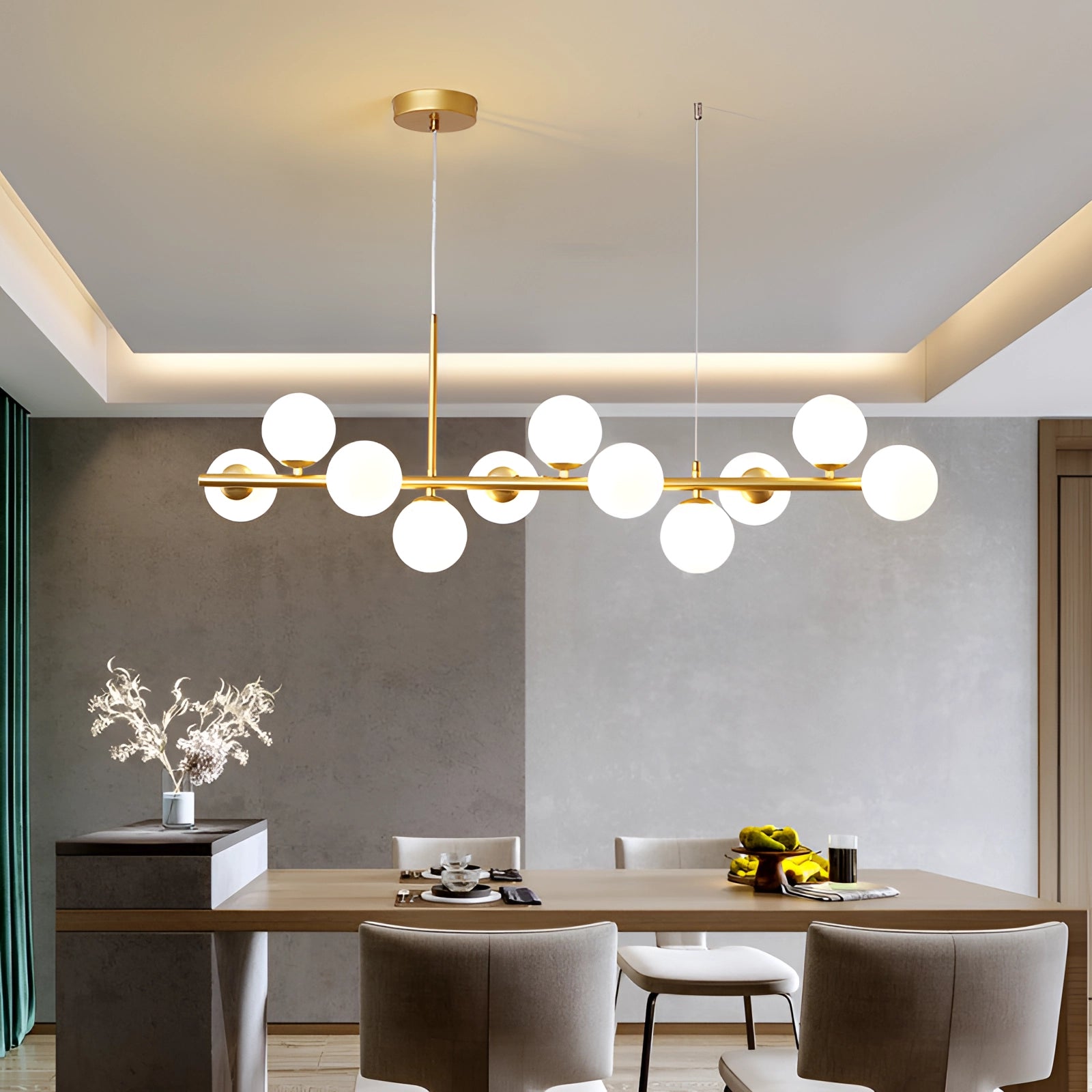 Modern glass globe chandelier with adjustable bronze pendant light fixture hanging in a stylish interior featuring a white table, wooden flooring, and grey accents.