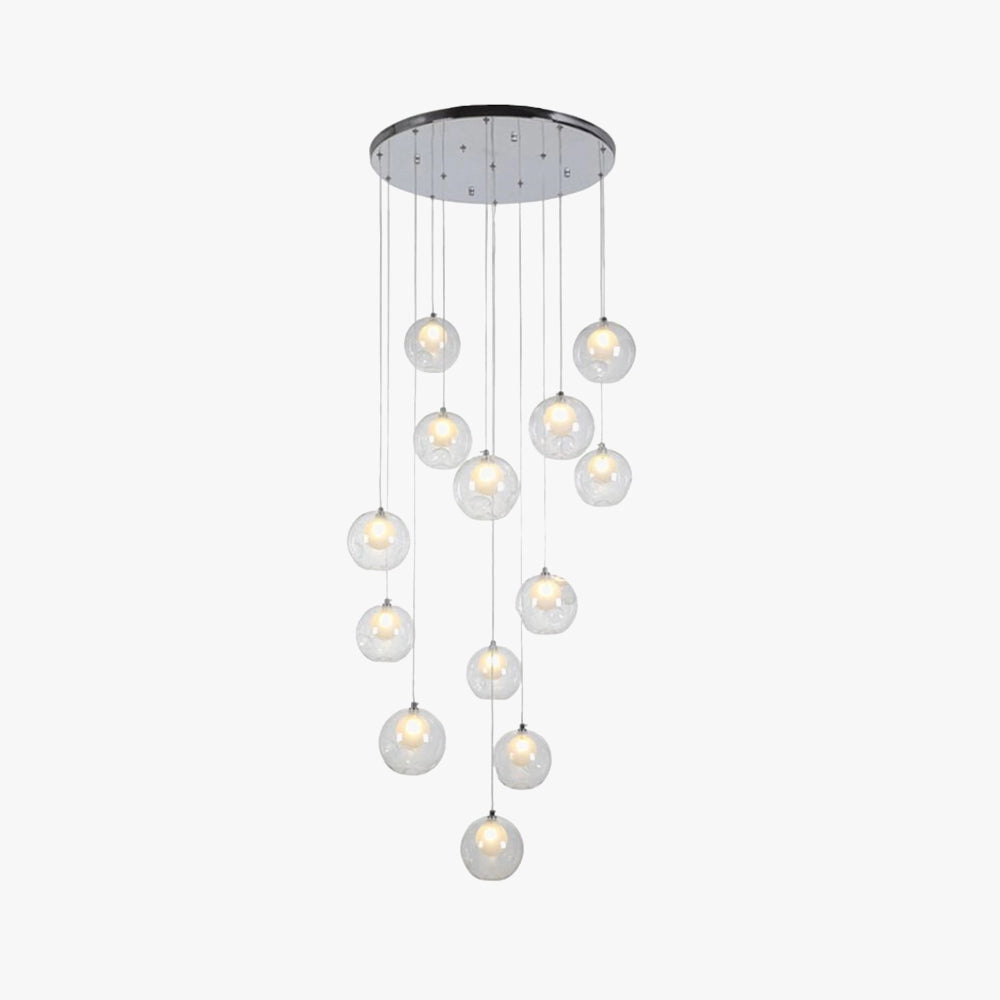 Modern globe pendant chandelier with an adjustable design, featuring a sleek LED light encased in a circular metal frame, made of aluminum and titanium, hanging from the ceiling as a stylish lighting fixture.