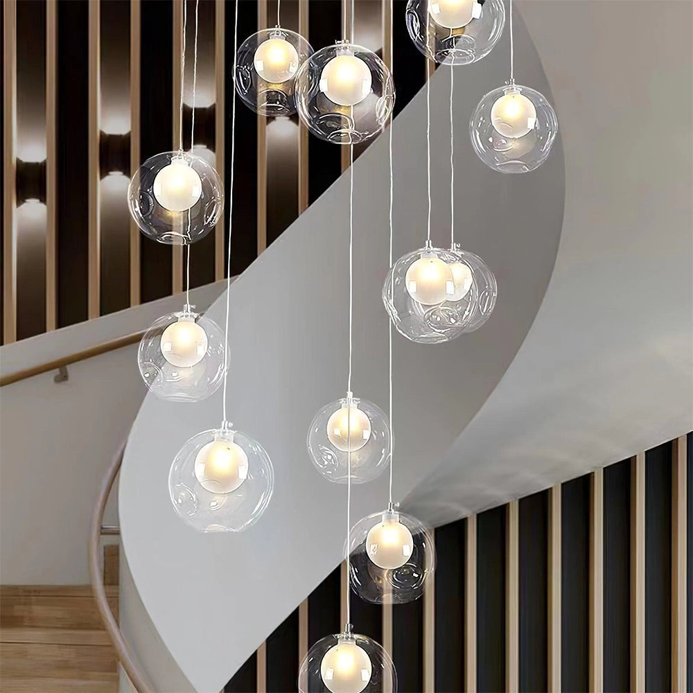 Modern globe pendant chandelier featuring a sleek design with a white finish, LED lighting, and adjustable height, complemented by natural wood and glass elements, ideal for enhancing interior decor.