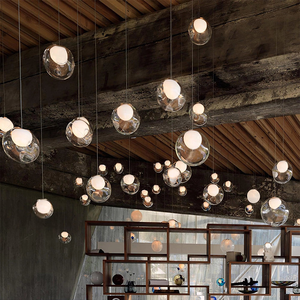 Modern globe pendant chandelier with round ceiling plate featuring 16 adjustable LED lights, measuring 23.6 inches in diameter, showcased in an interior setting emphasizing contemporary lighting and decoration.