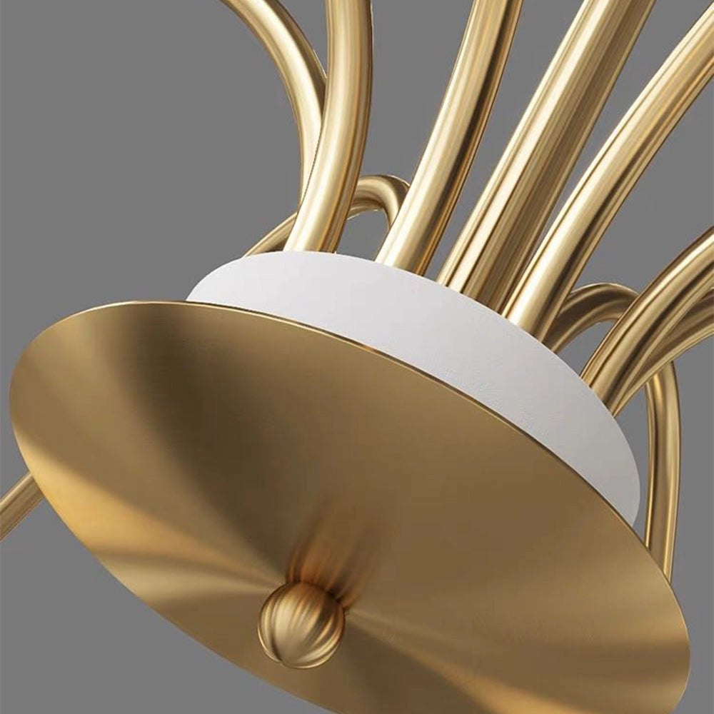 Modern gold chandelier with eight white glass globe lights and a brass finish hanging from the ceiling, showcasing a circular and artistic design.