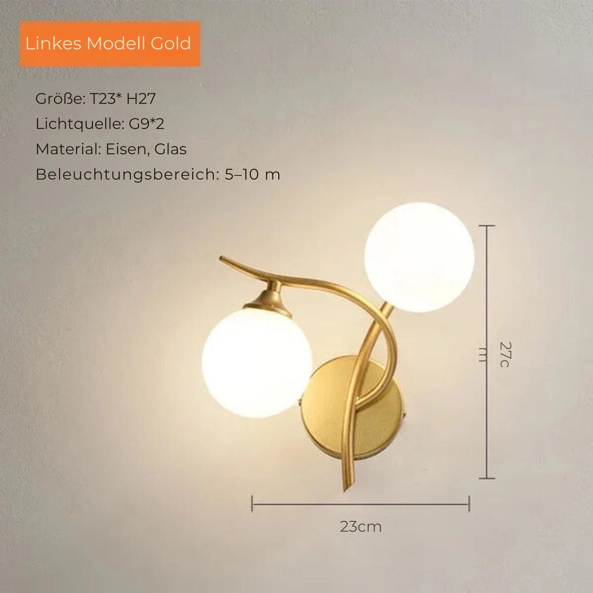 Modern gold double globe wall sconce with brass finish, featuring a mid-century design and a cool white illumination (5500-7000K), mounted on a wall with a decorative plant.
