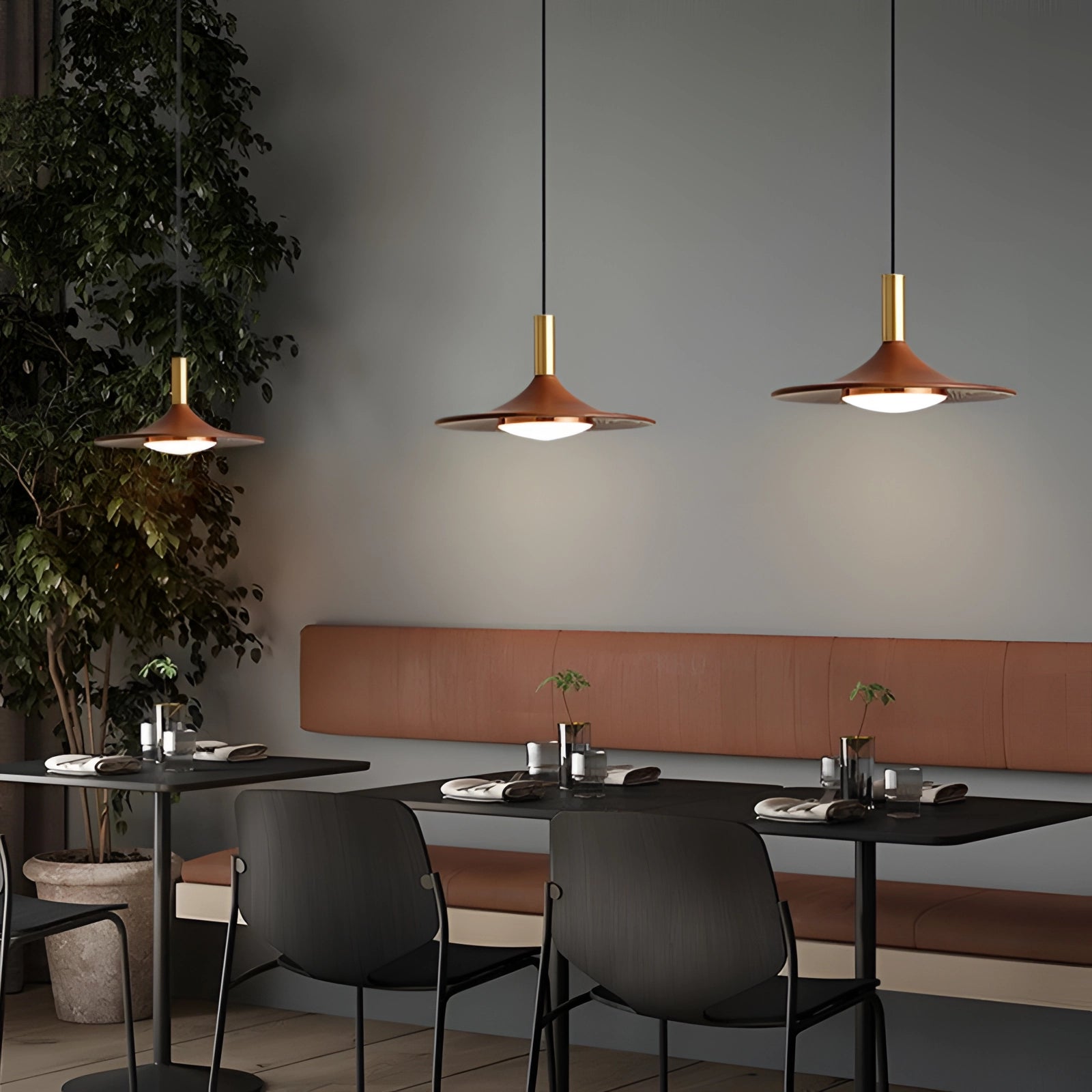 Modern gold LED pendant light with Scandinavian design, featuring a 14-inch fixture with three lights and third gear dimming, hanging over a wooden table in a contemporary interior setting.