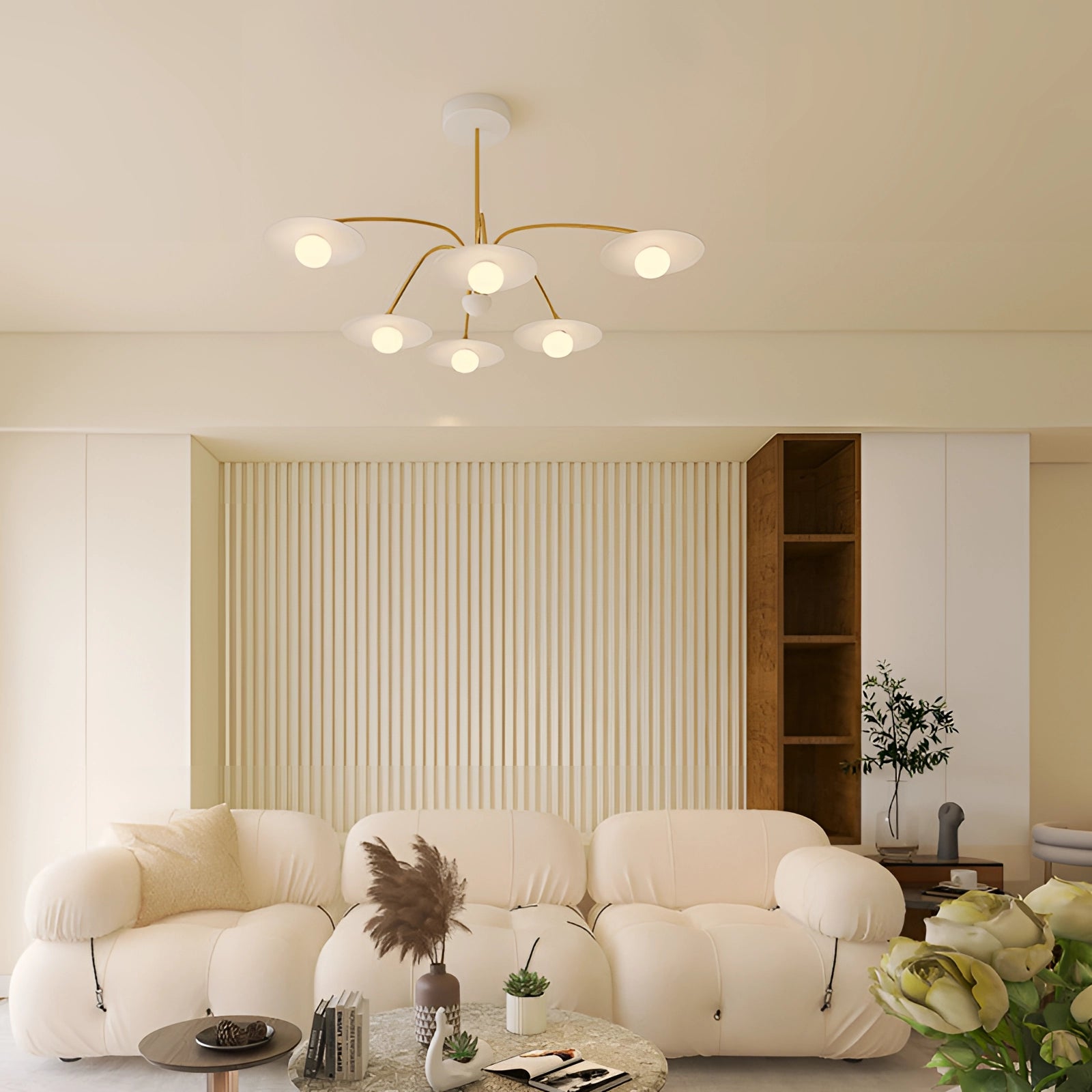Modern gold opal glass mid-century chandelier elegantly hanging in a stylish living room with a beige couch, indoor plant, and contemporary interior design elements.