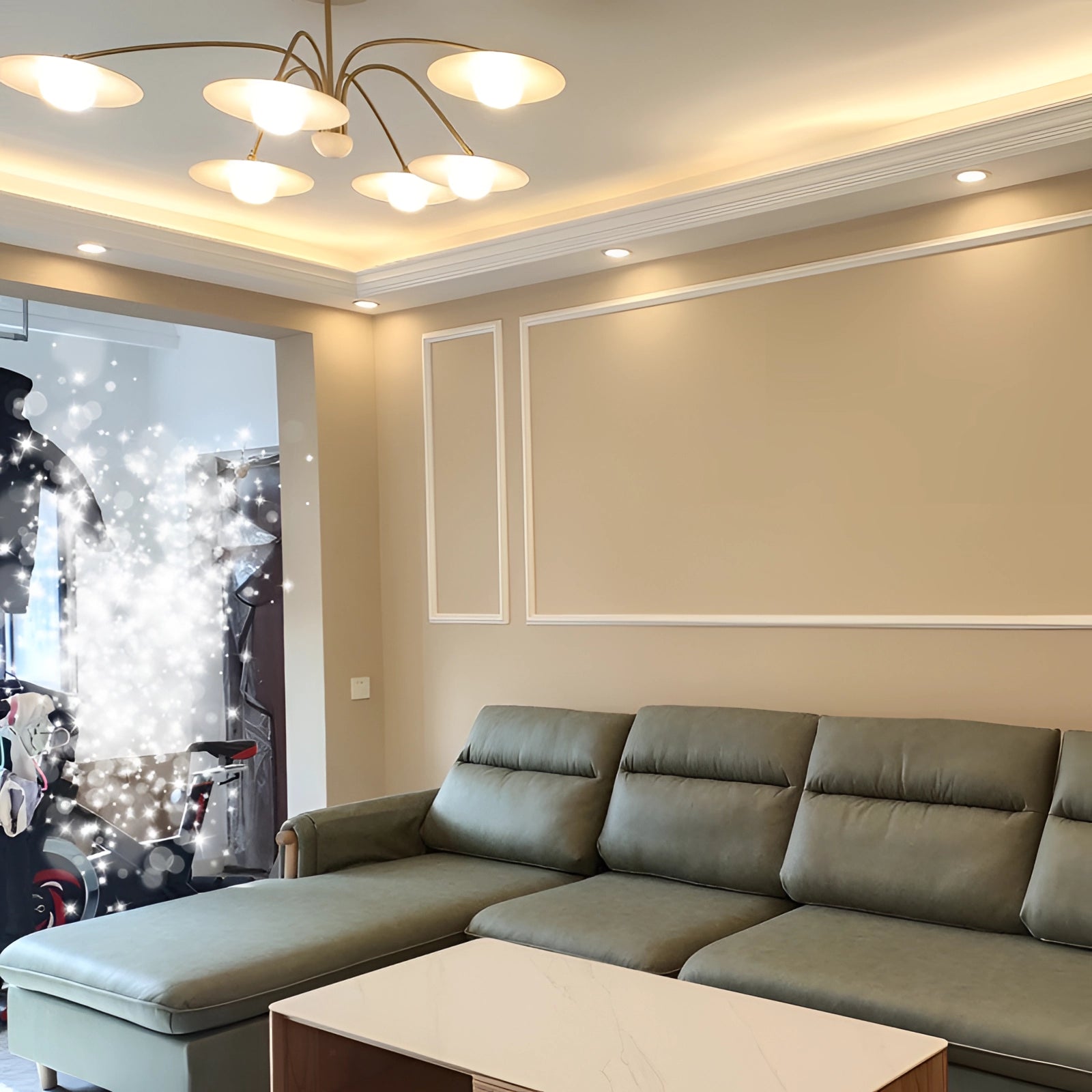 Elegant mid-century chandelier with gold finish and opal glass shades, suspended in a stylish living room featuring a comfortable couch, wood flooring, and modern interior design elements.