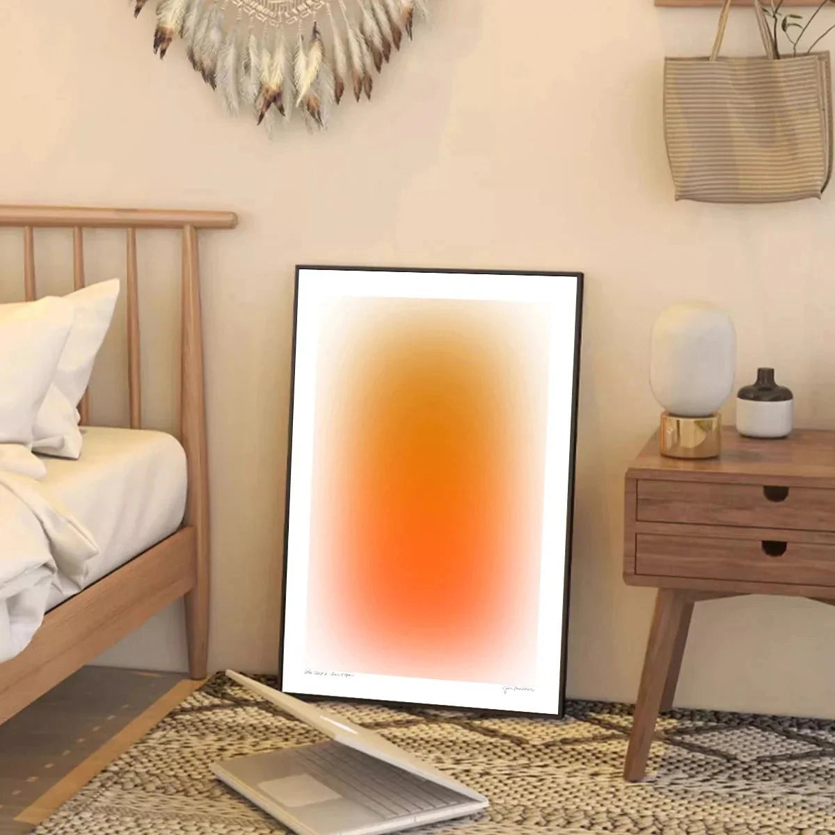 Orange and blue modern gradient wall art on a canvas, displayed in a minimalist interior setting with wooden flooring and white walls, illuminated by soft lighting.