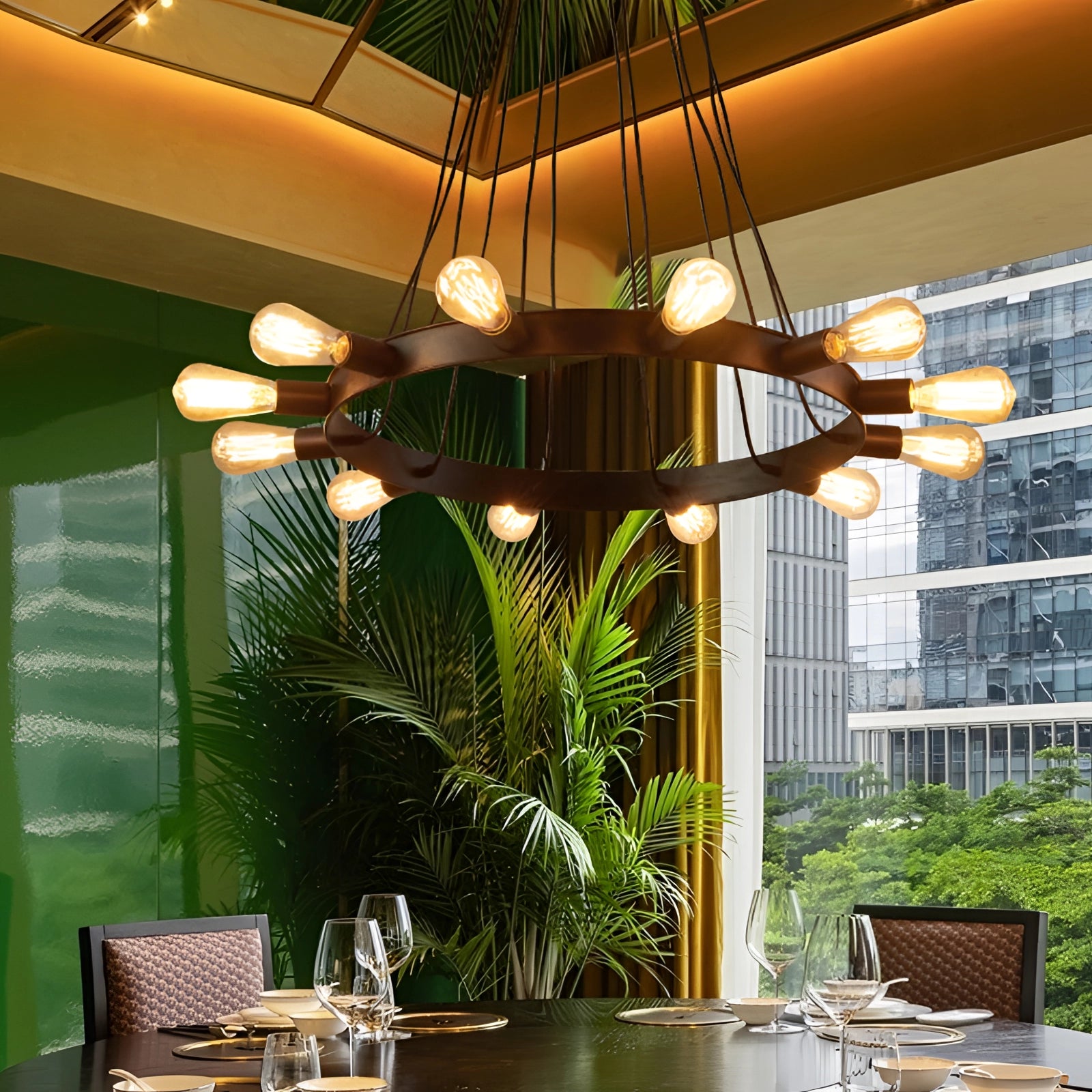 Modern industrial LED chandelier with a circular design, elegantly hanging in a contemporary interior setting, surrounded by minimalistic furniture and decorative plants.