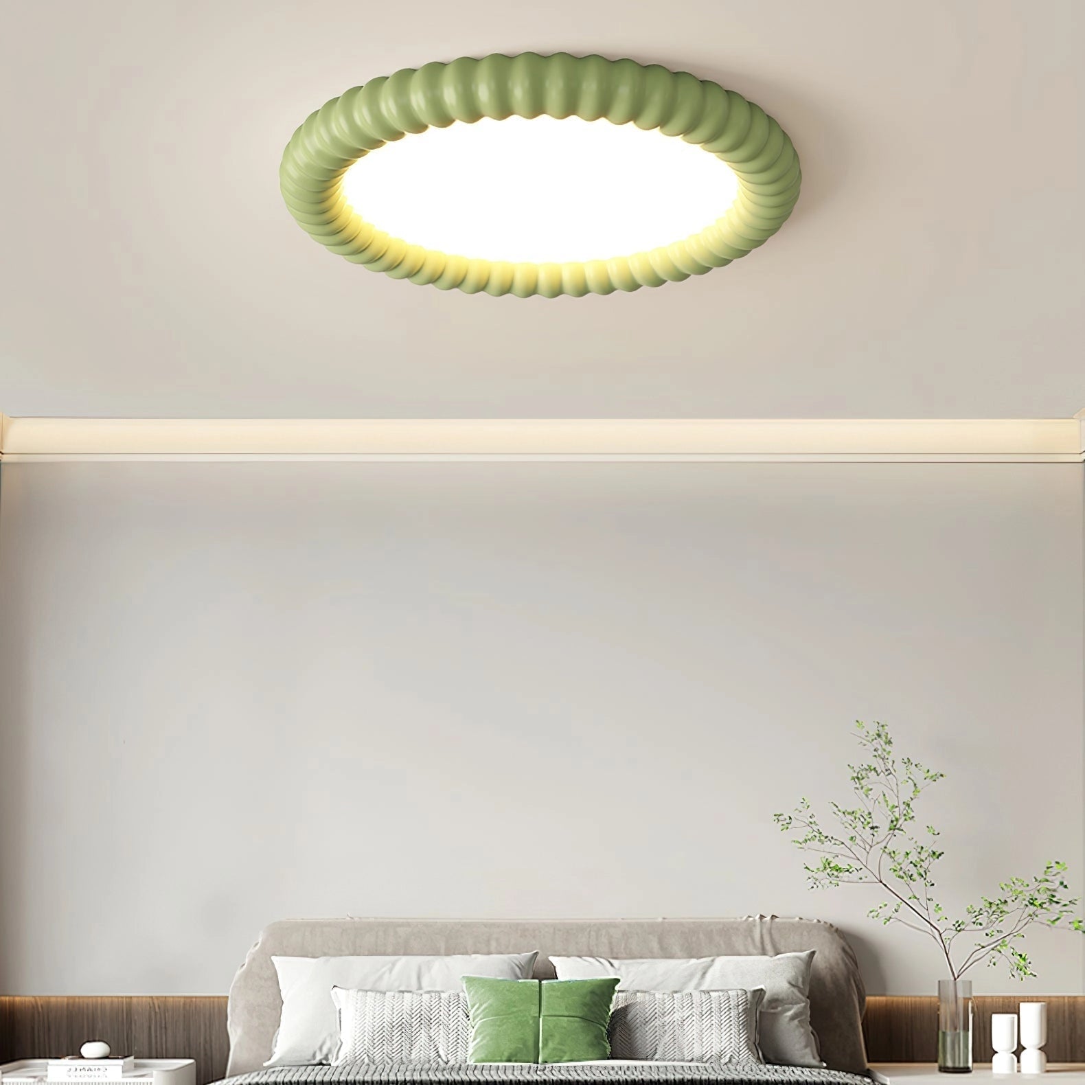 Modern LED ceiling light in a stylish, dimmable, and energy-efficient design installed in a contemporary interior with white and green accents, wood elements, and indoor plants.