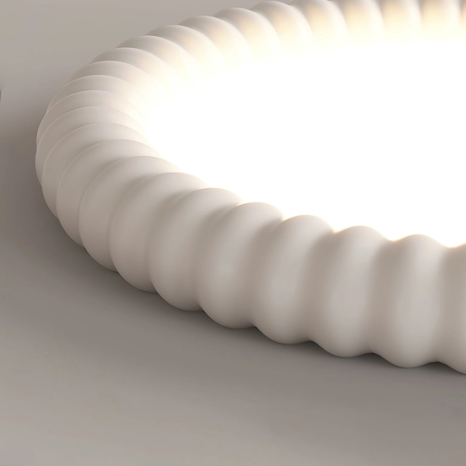 Modern LED ceiling light with a circular design, casting a gentle shadow, installed on a wooden ceiling.