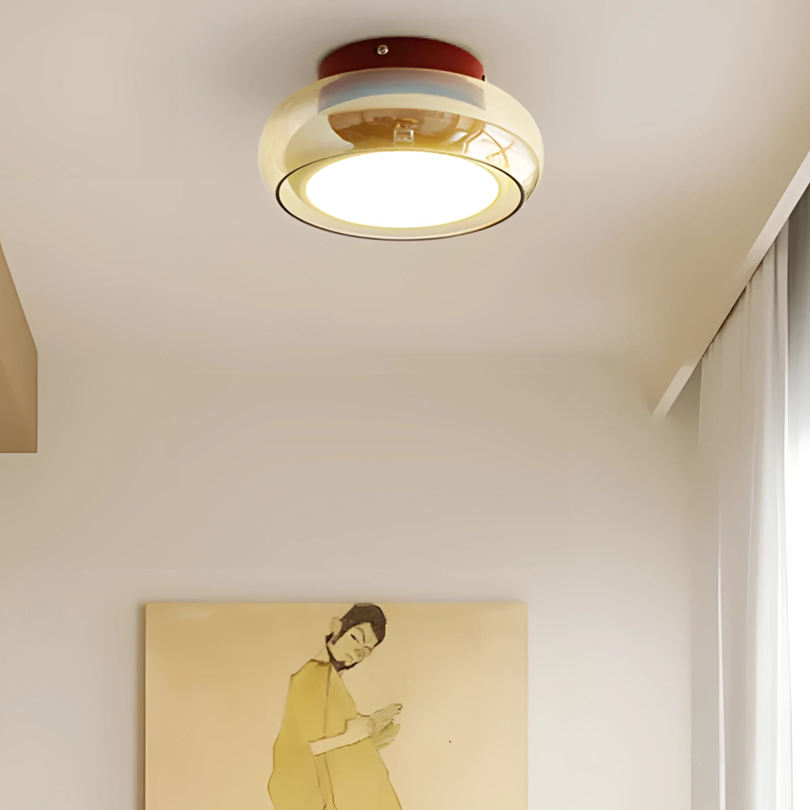 Modern LED ceiling light fixture in Braun variant with a minimalist design, featuring a sleek combination of white and wood elements, illuminating a room with a warm yellow light. The fixture highlights interior design aesthetics and complements the flooring with its stylish appearance.