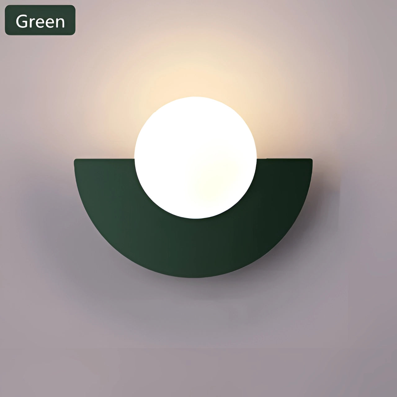 Modern LED half-moon wall light with a sleek green finish, featuring three-color light options, suitable for minimalist living room decor.