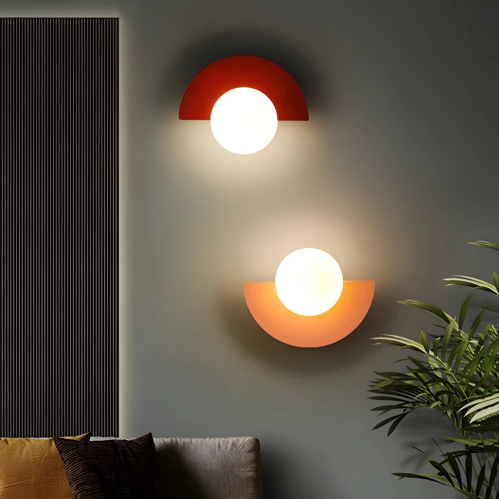 Modern LED half-moon wall light with a minimalist design, featuring a warm orange glow against a wood-textured wall, suitable for a living room setting.