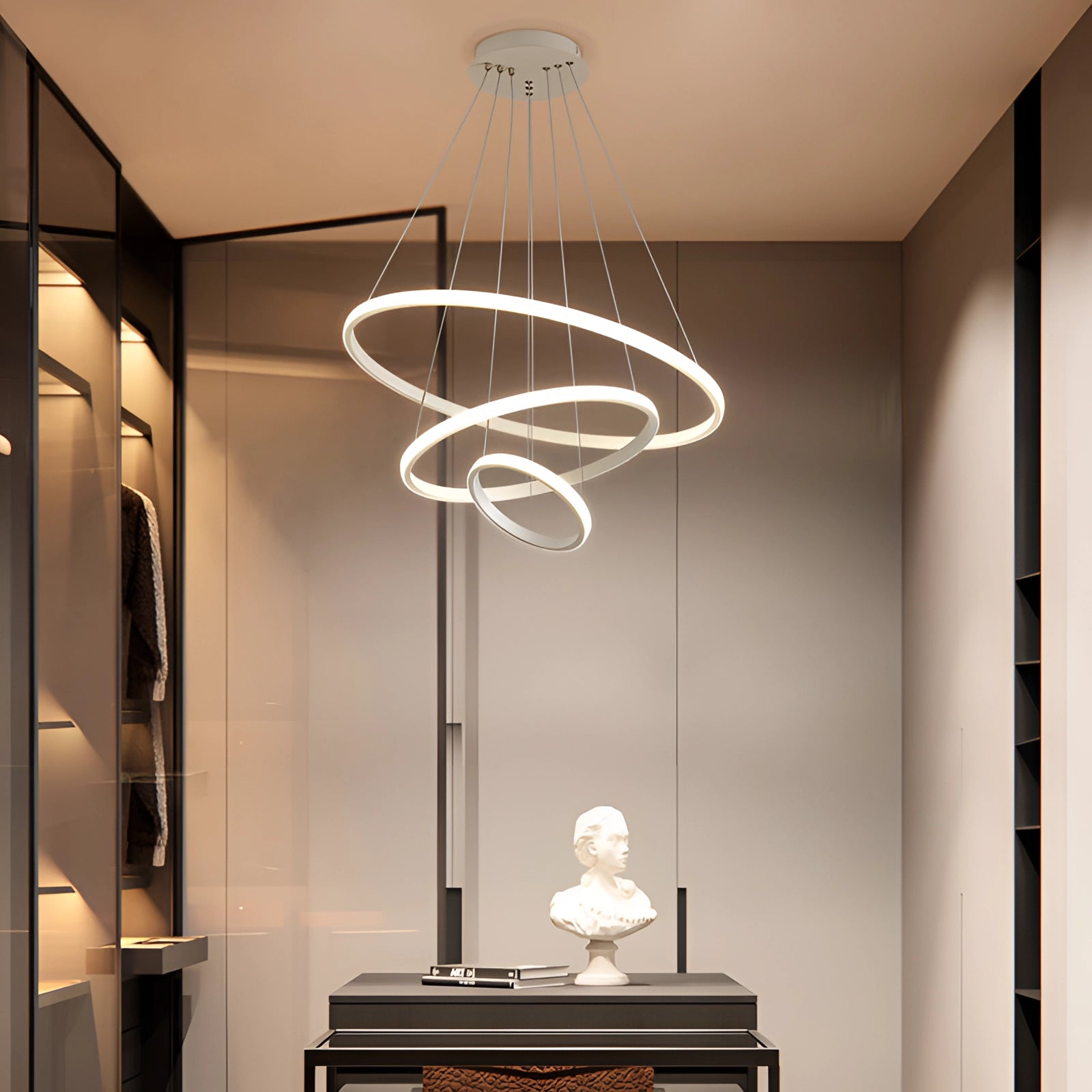 Modern white LED infinity chandelier with a minimalist design, featuring adjustable ceiling light suitable for contemporary interior spaces, with wooden and artistic elements visible in the background.