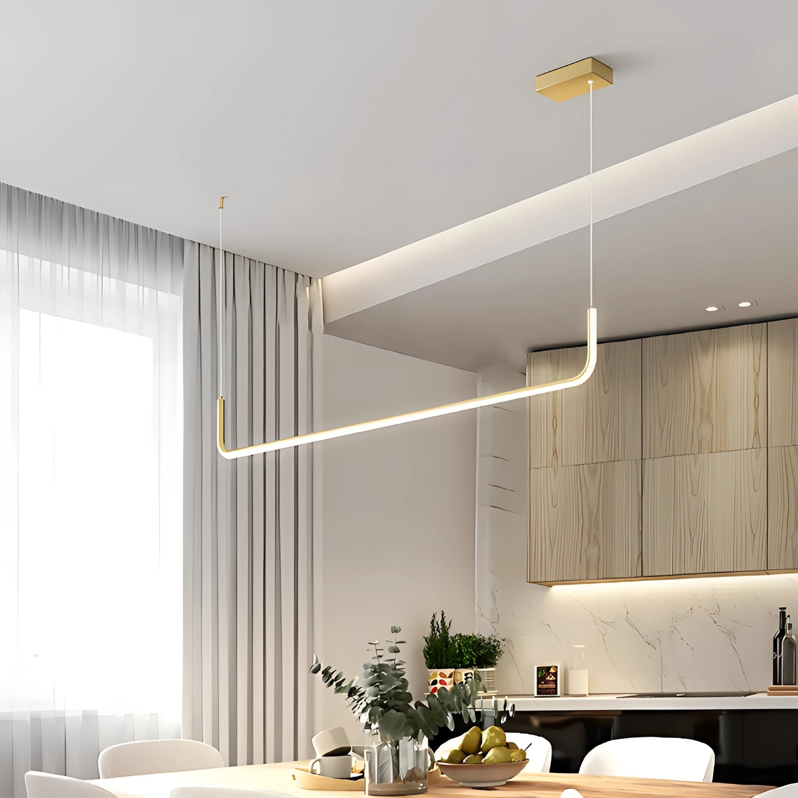 Modern LED pendant light with a geometric design hanging from the ceiling, featuring adjustable elements and casting light over a contemporary interior space with wooden flooring and a large window.
