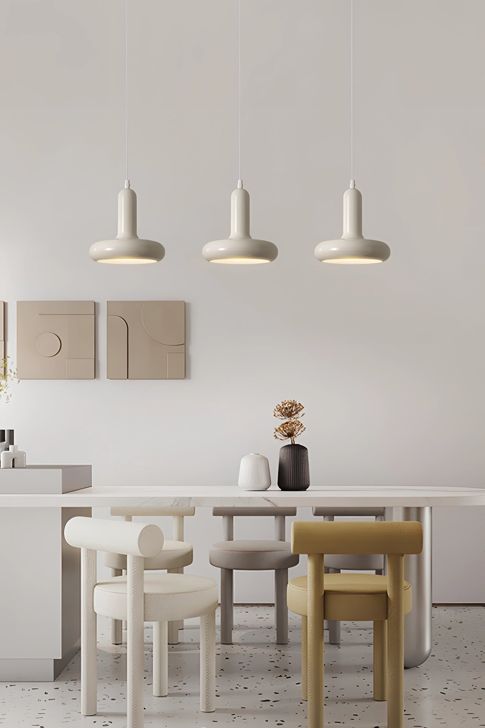 Modern Scandinavian-style kitchen and dining area featuring a minimalist LED pendant light, wood table and chairs, and neutral color tones.