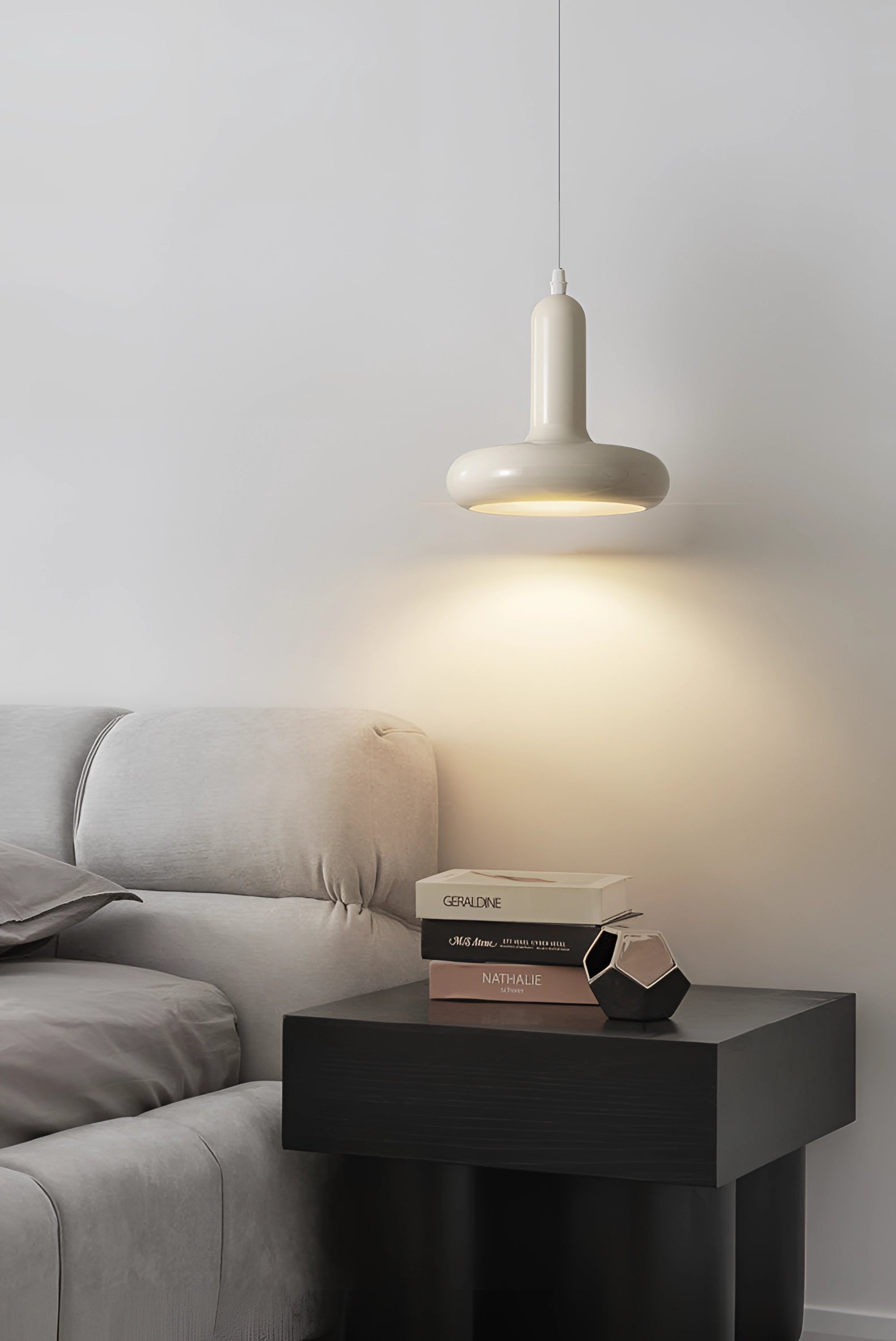 Modern LED pendant light with a Scandinavian minimalist design, featuring a wooden accent and sleek grey finish, illuminating a stylish kitchen or dining interior.