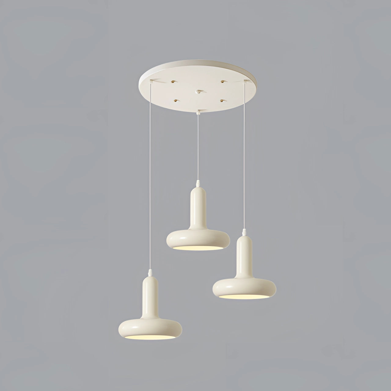 Modern LED pendant light fixture with a round base design, featuring a Scandinavian minimalist style, hanging from the ceiling. The set includes three pendants, each with a sleek metal body and a neutral lampshade, providing ambient lighting suitable for kitchen and dining areas.