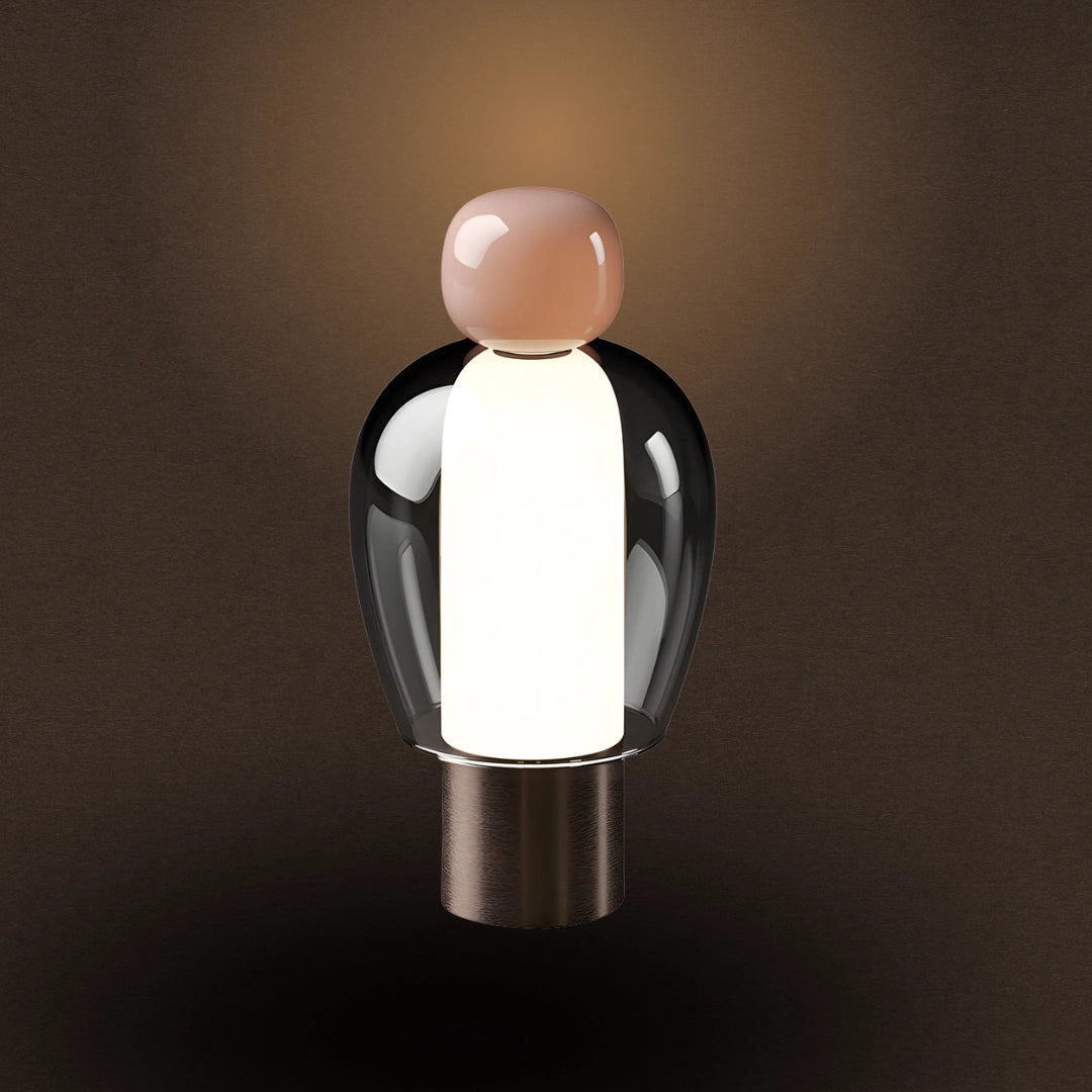 Modern LED table lamp with a minimalist design in pink, featuring dimmable luxury lighting.