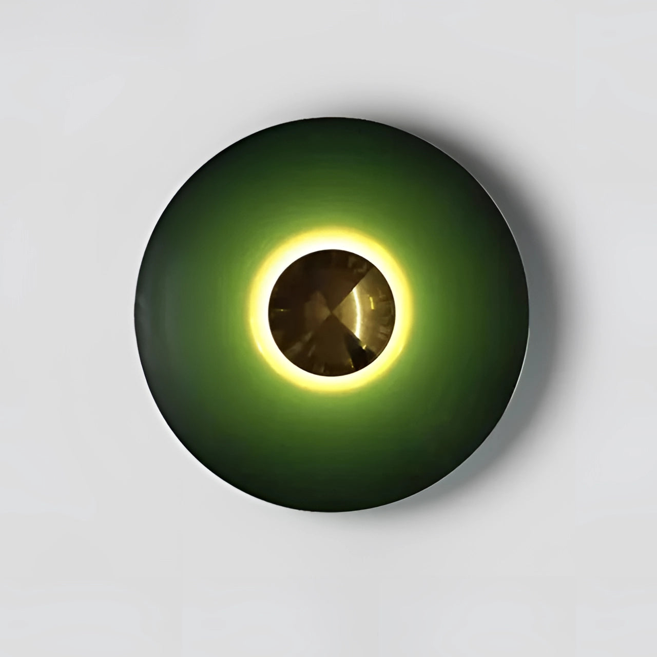 Modern LED wall lamp in a minimalistic brass design with a green and gold finish, measuring 60cm and emitting cold white light, mounted on a dark background.