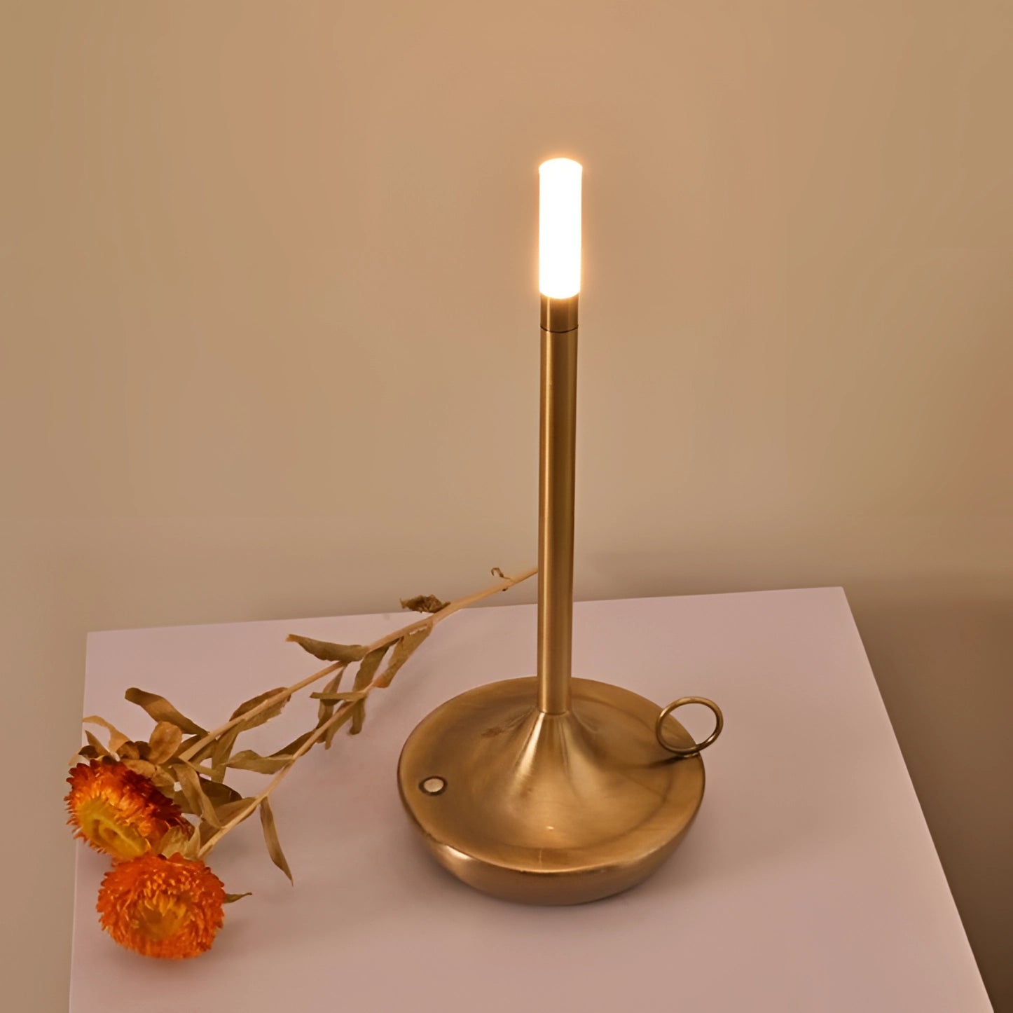 Modern luxury metallic candle holders on a wooden table, featuring elegant design and artful craftsmanship, perfect for home decor.