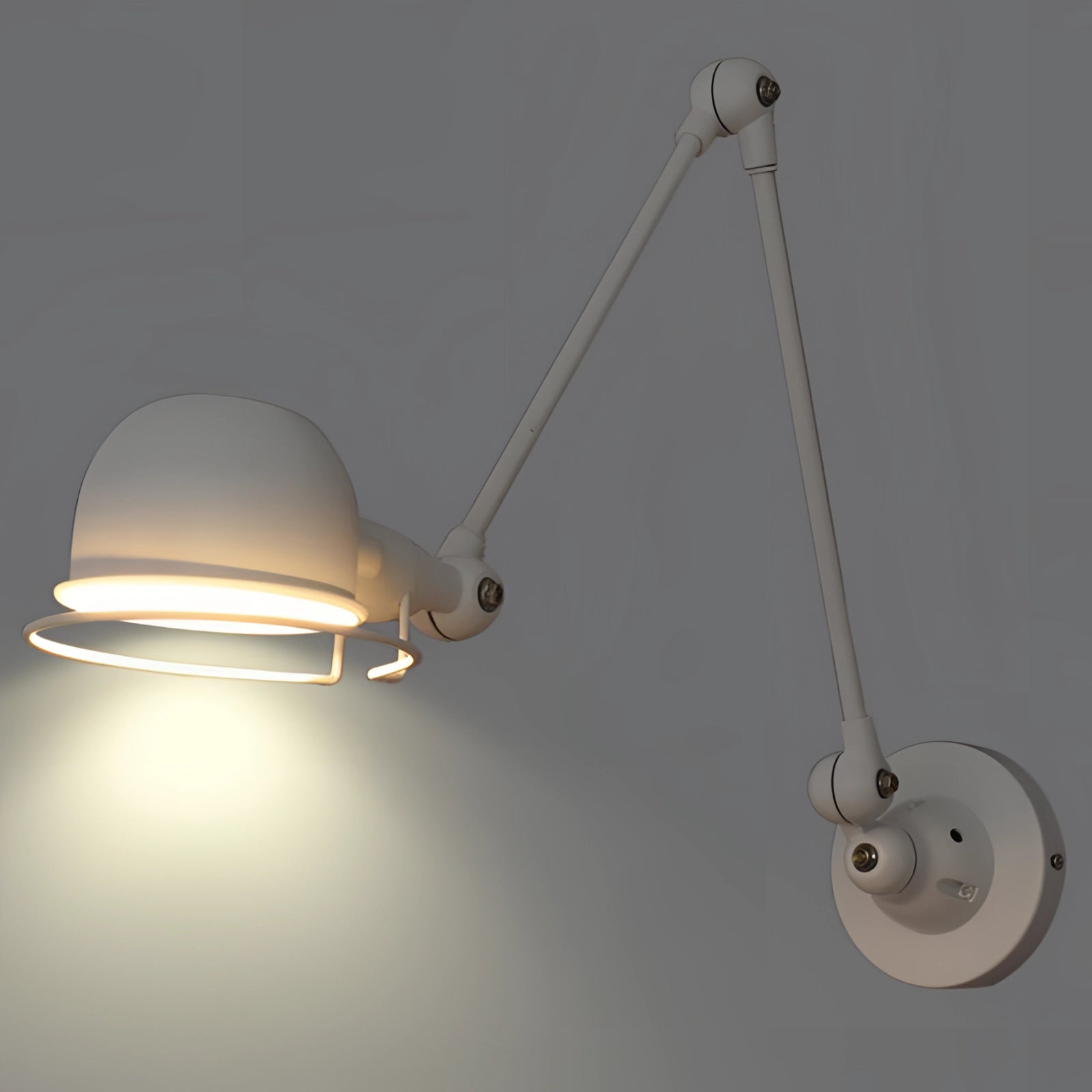 Modern matte black swing arm wall lamp with adjustable industrial sconce design, featuring a long white arm.