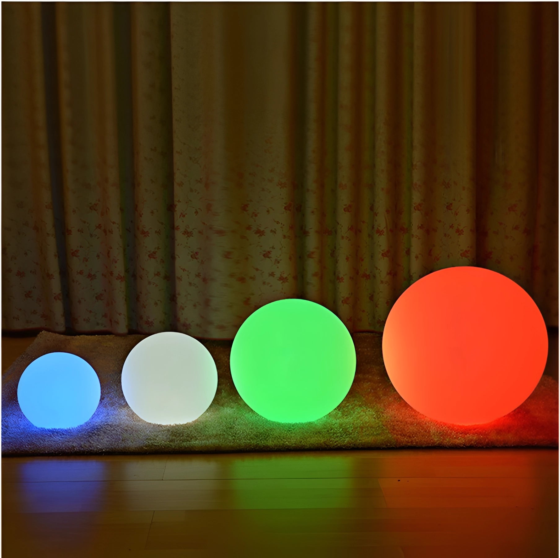 Modern Minimalist LED Globe Lamp with warm amber light, cordless and rechargeable, featuring a circular design on a rectangular wooden base.